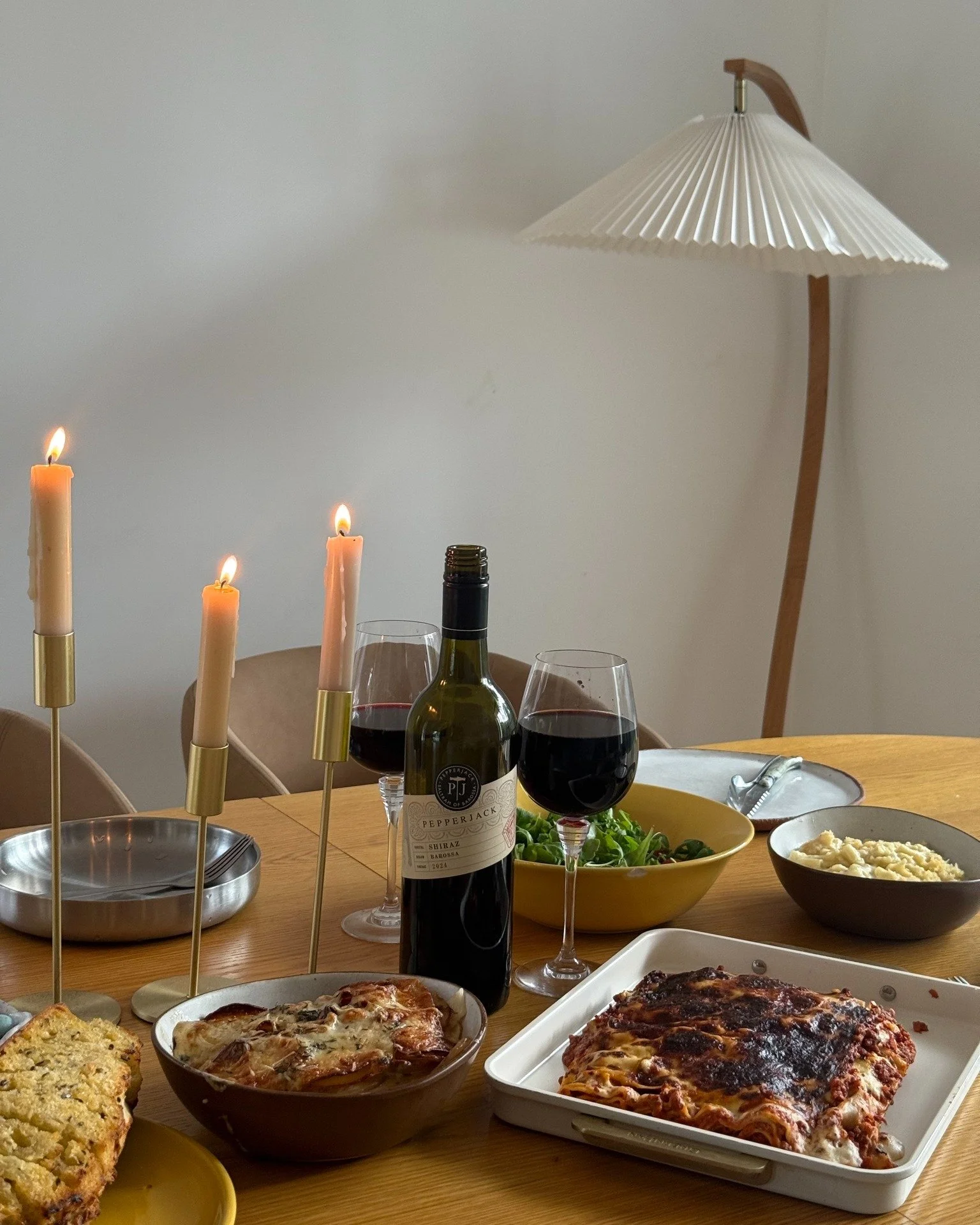 HOMEY AT HOME with @ashkeillah &amp; staceykeillah. On the table: beef lasagne, mac &amp; cheese, potato gratin and tiramisu