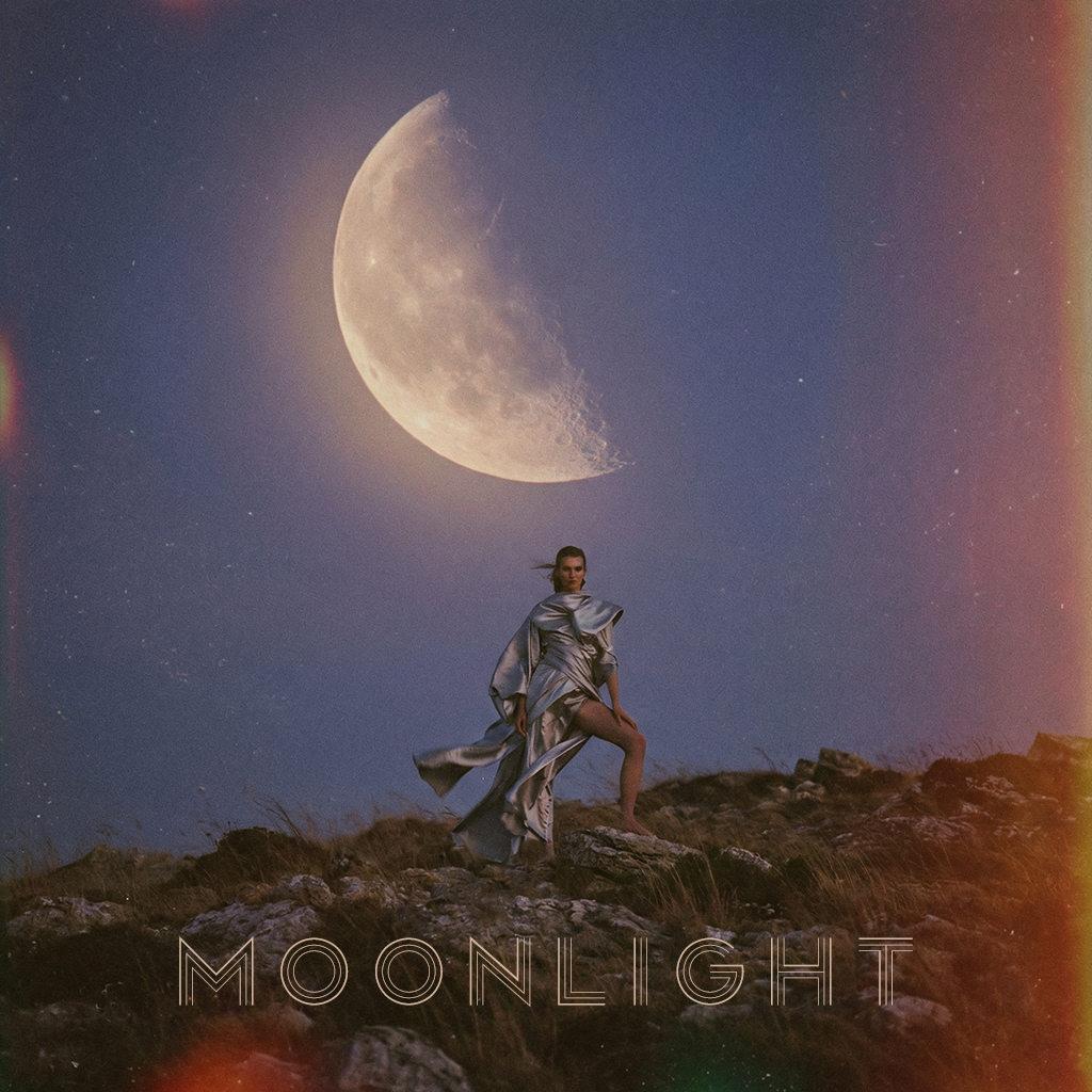 A woman in a metallic dress standing on a rugged hillside with a large moon and starry sky behind her, and the word 'MOONLIGHT' at the bottom.