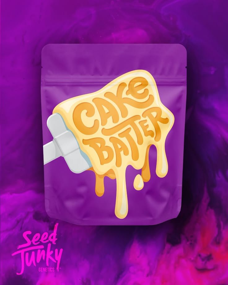 Purple package with a label that says "Cake Batter" and a stylized ice cream scoop dripping with batter. Pink text reads "Seed Junky Genetics" in the bottom left corner.