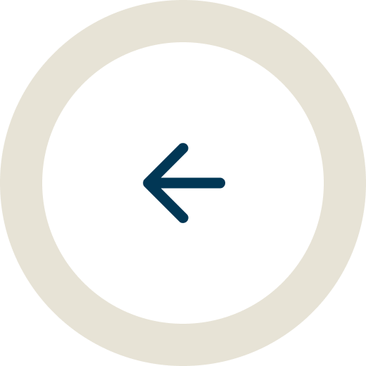 A circular back button with a leftward pointing arrow in the center.