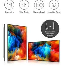 Two flat-screen monitors displaying vibrant abstract art with colorful clouds of pigment.