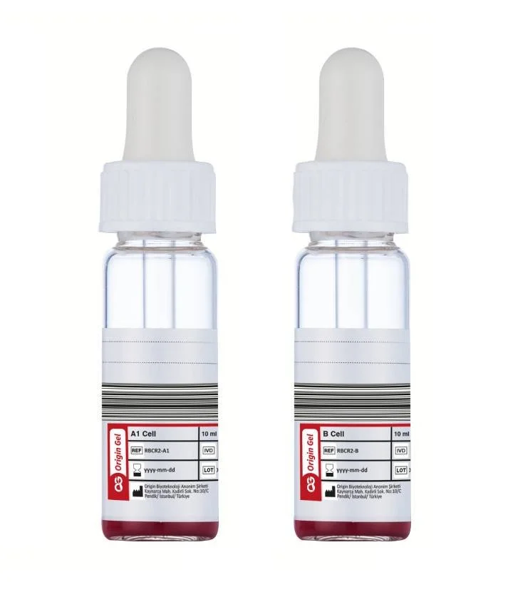 Two small glass bottles with white dropper caps containing blood samples, labeled as A1 Cell and B Cell.