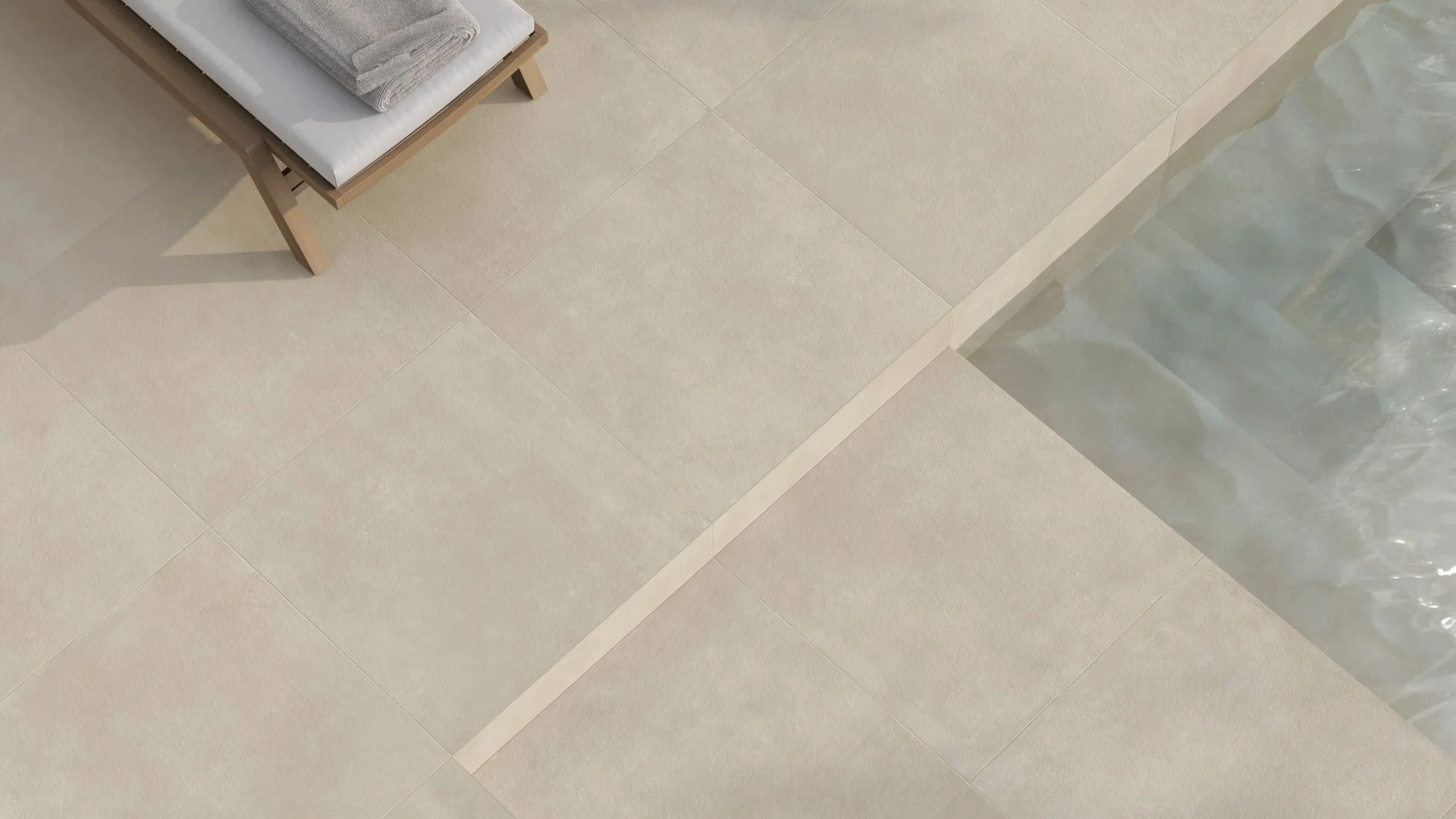 Isot beiget laatat  kuvattuna yläältä päin. 