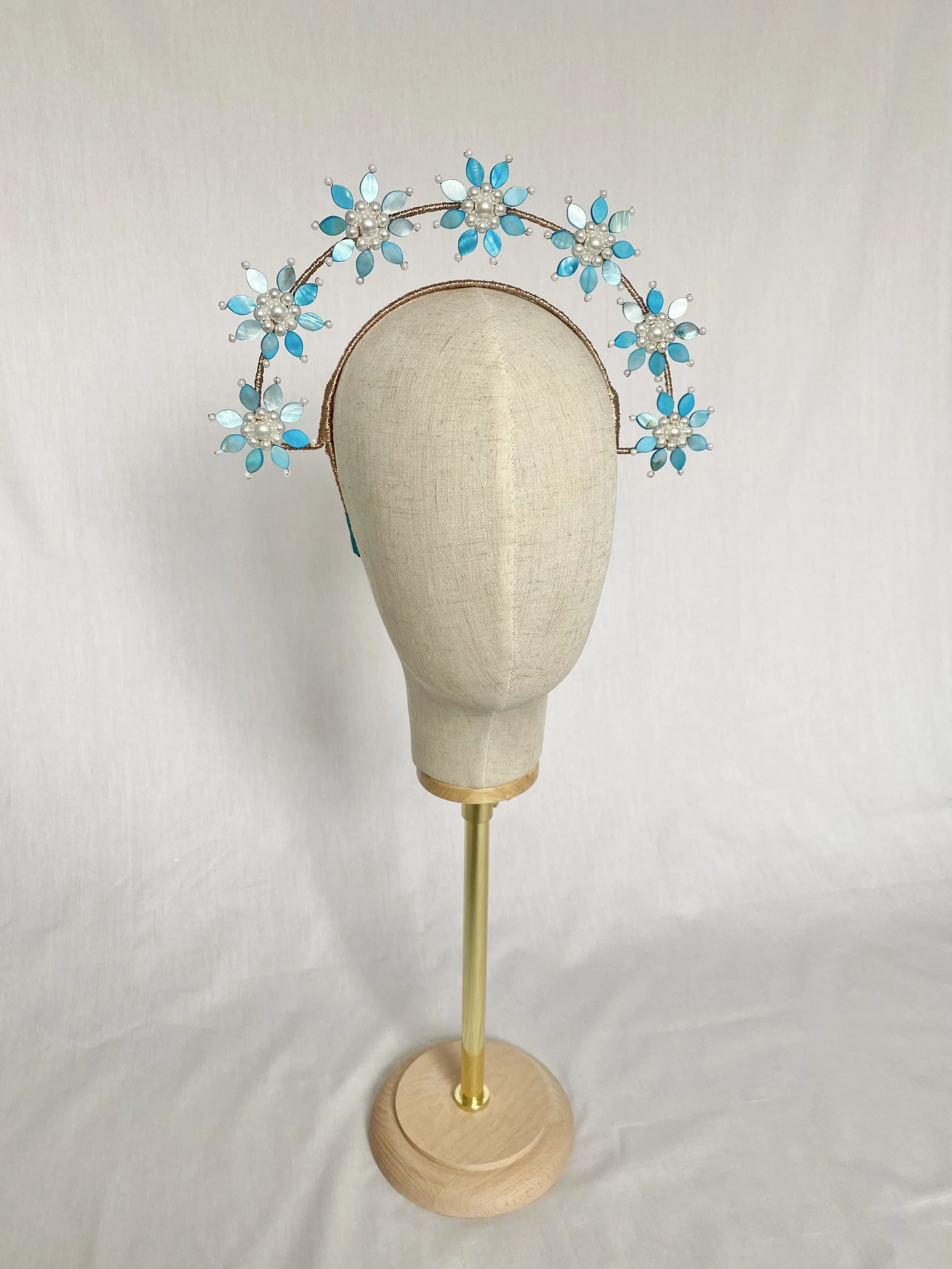 Beaded Shell Flower Crown Blue & Pearl
- Hire $40 per week
- Retail $265