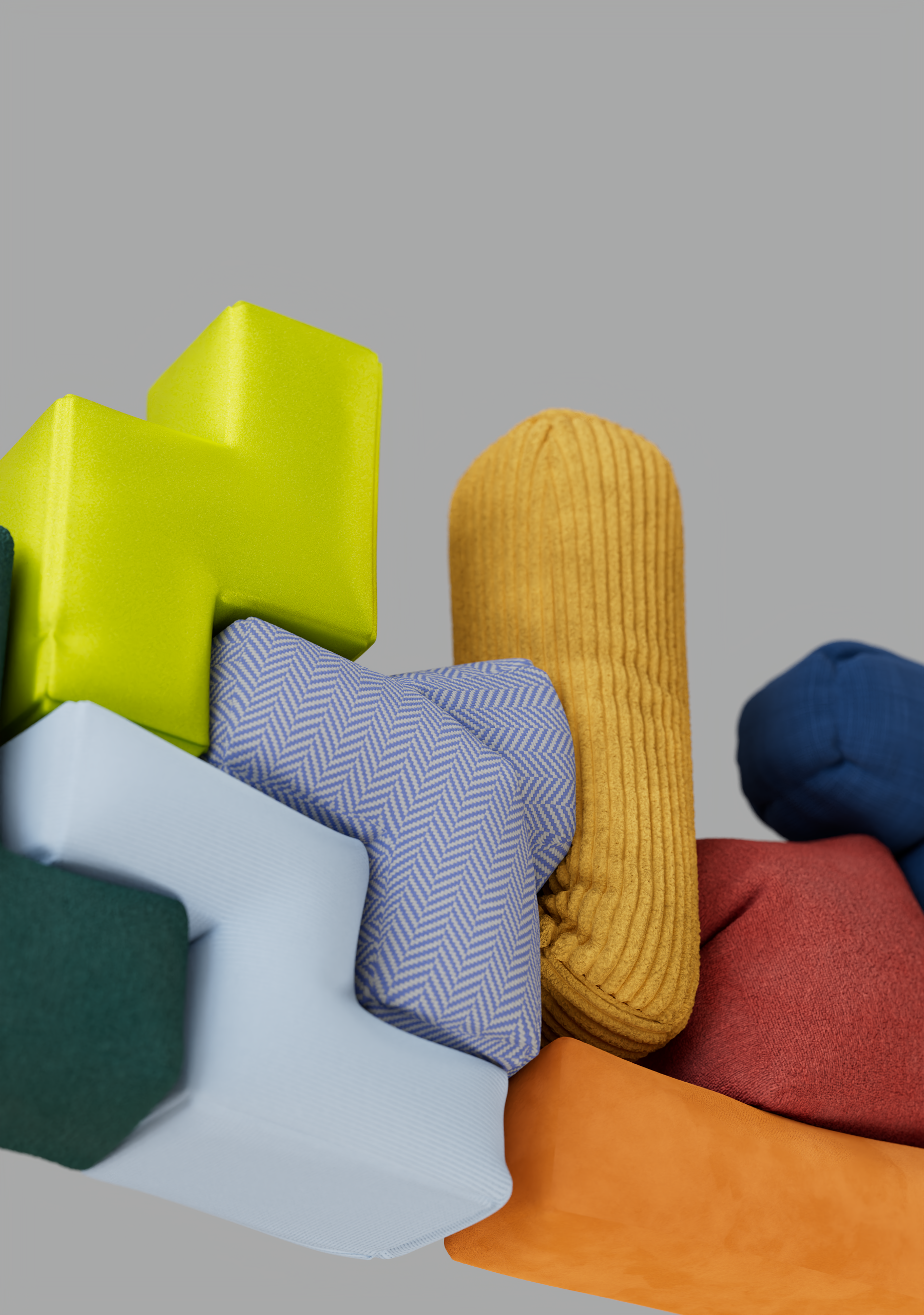 Assemblaggio di cuscini e rivestimenti di diversi colori e tessuti, tra cui verde, blu, giallo, rosso e arancione.