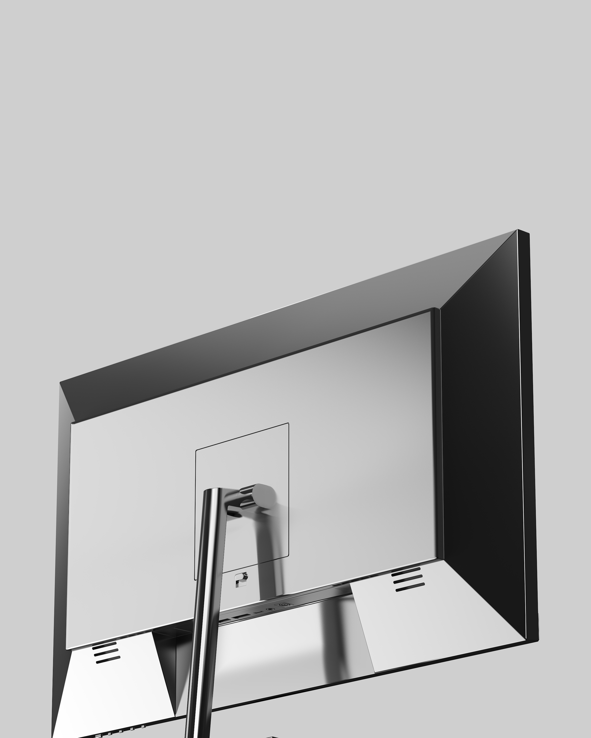 Retrovisore di un veicolo con vista dall'alto, superficie nera, con supporto metallico.