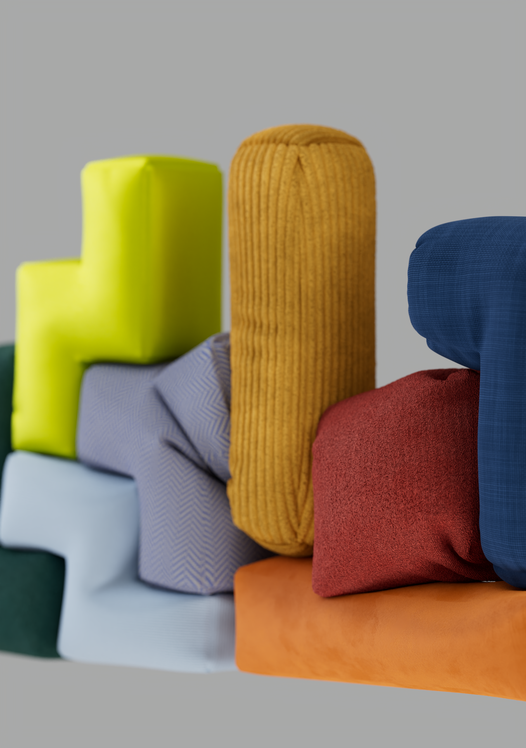 Sofà con cuscini di vari colori e tessuti