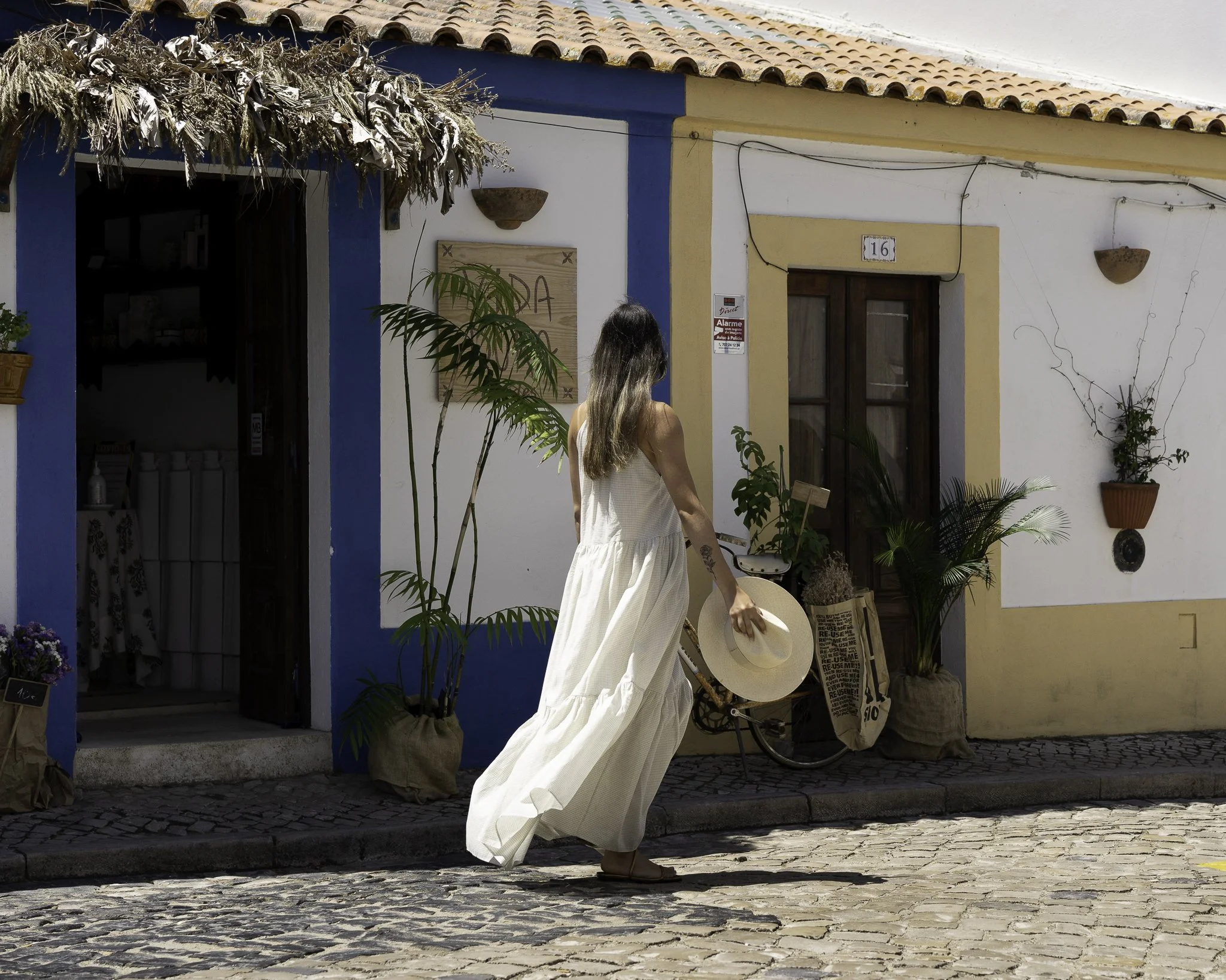 An image of a women walking on the street.