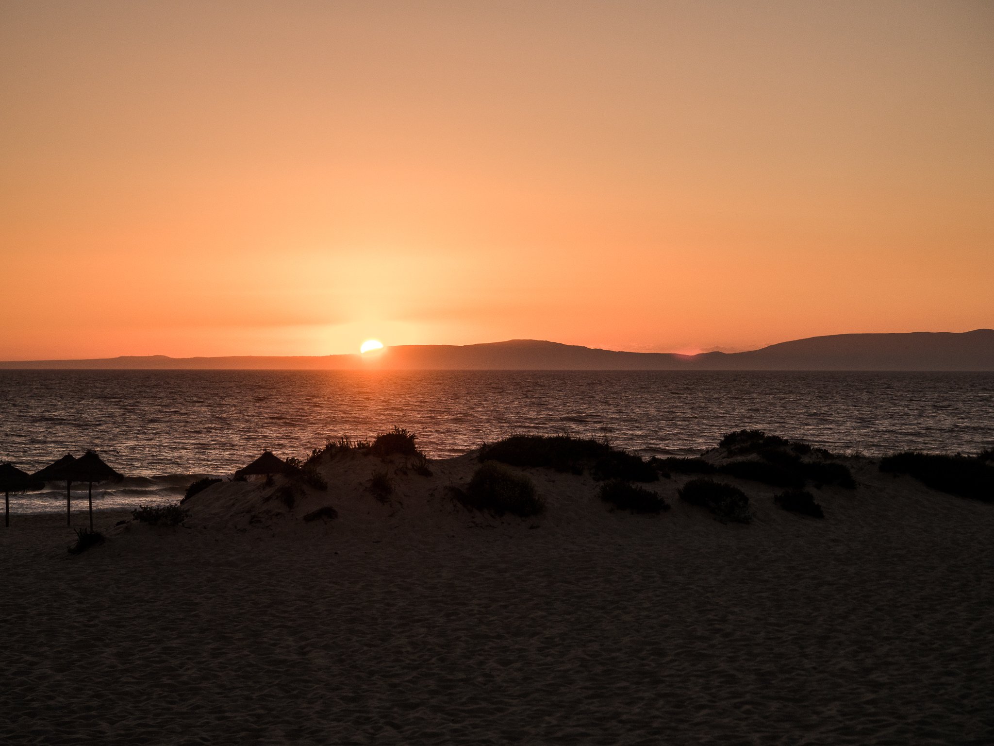 An image of the sunset on the beach.