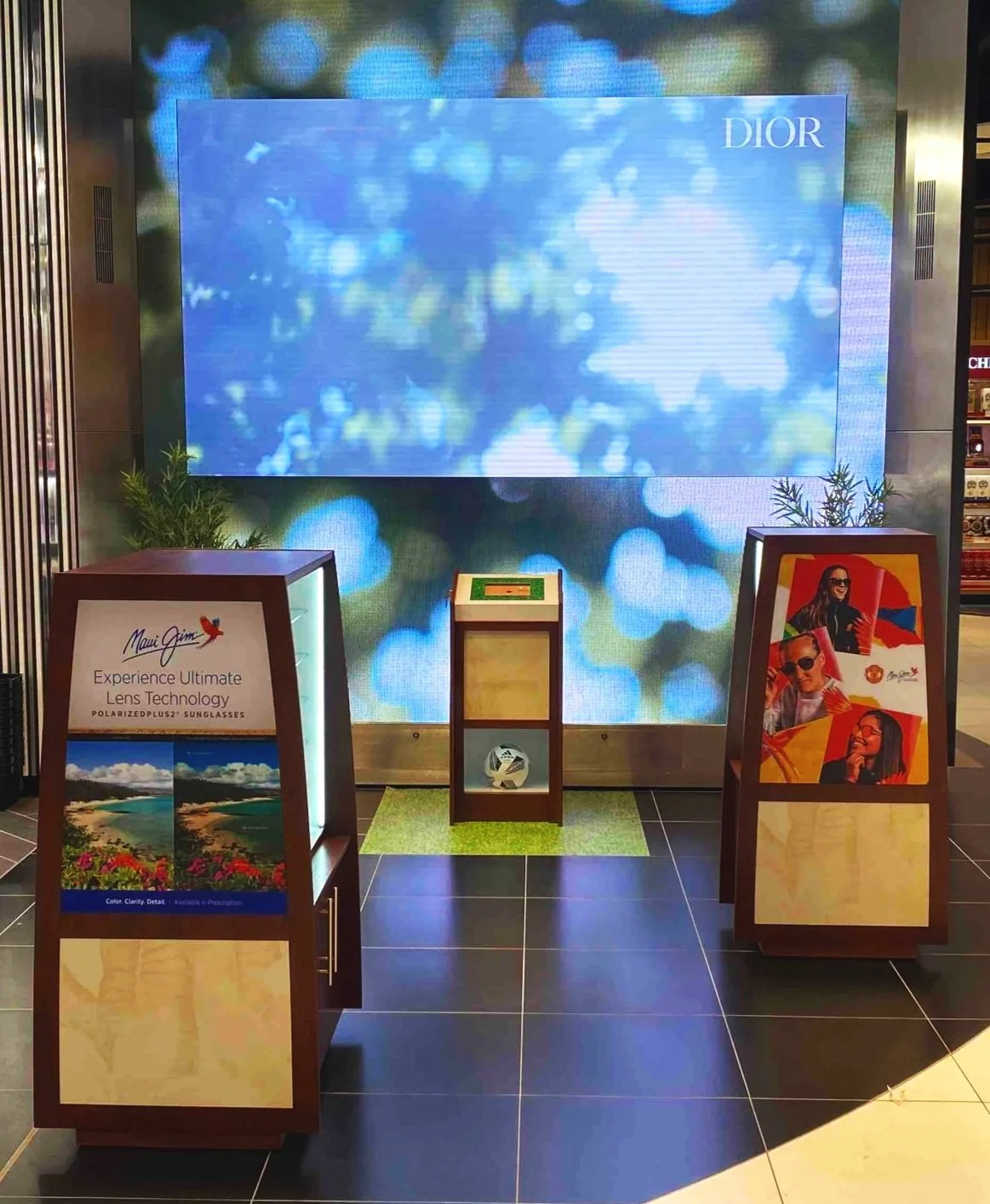 Maui Jim for Manchester United at Manchester Airport Duty Free Retail Store. Designed, Created, Manufactured and installed By Vision. Creative Visual Marketing
