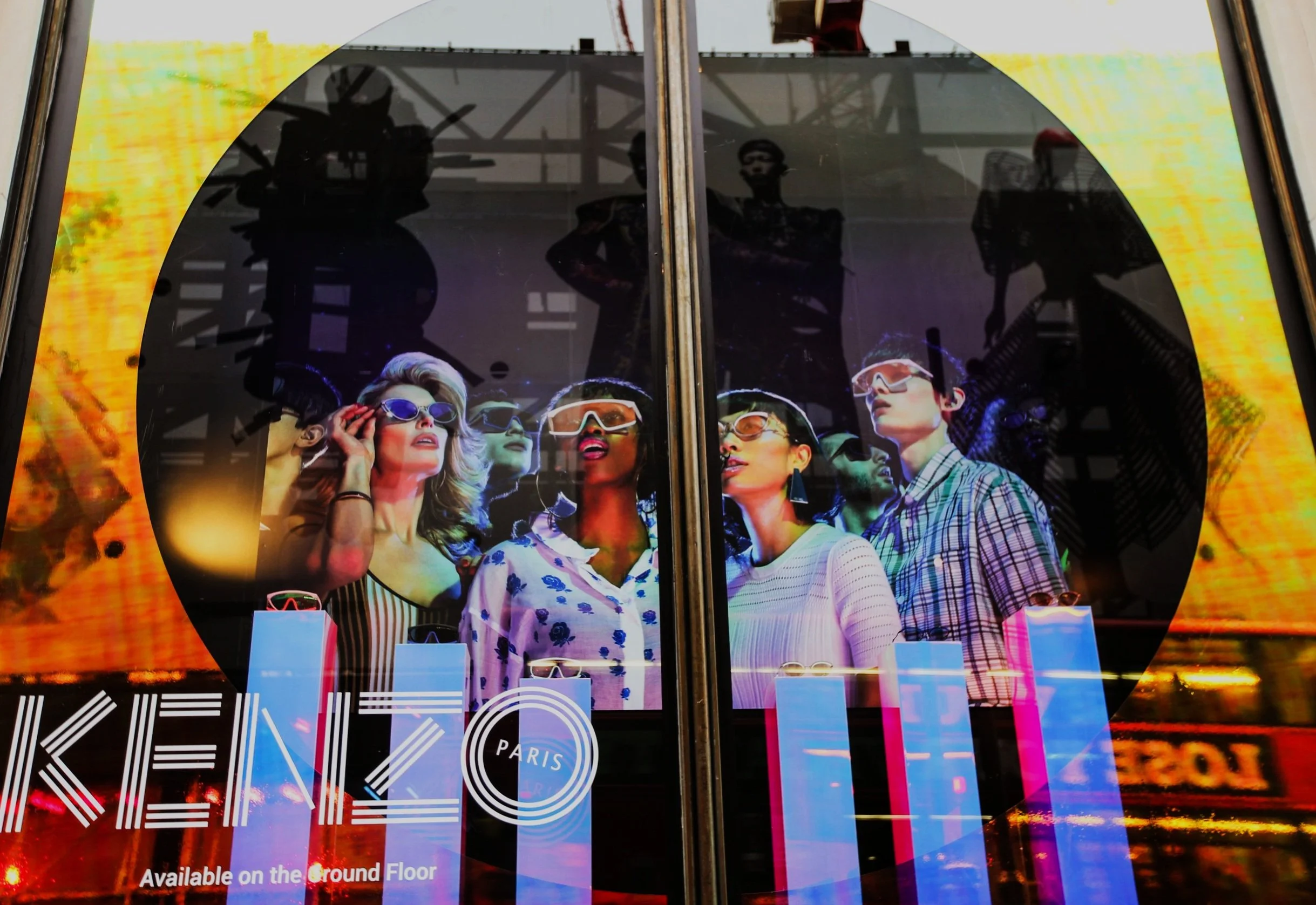 Kenzo Retail Window Display for Harvey Nichols London Sloane Street. Created Manufactured and Installed By Vision Creative Visual Marketing Company using Dichroic Techniques