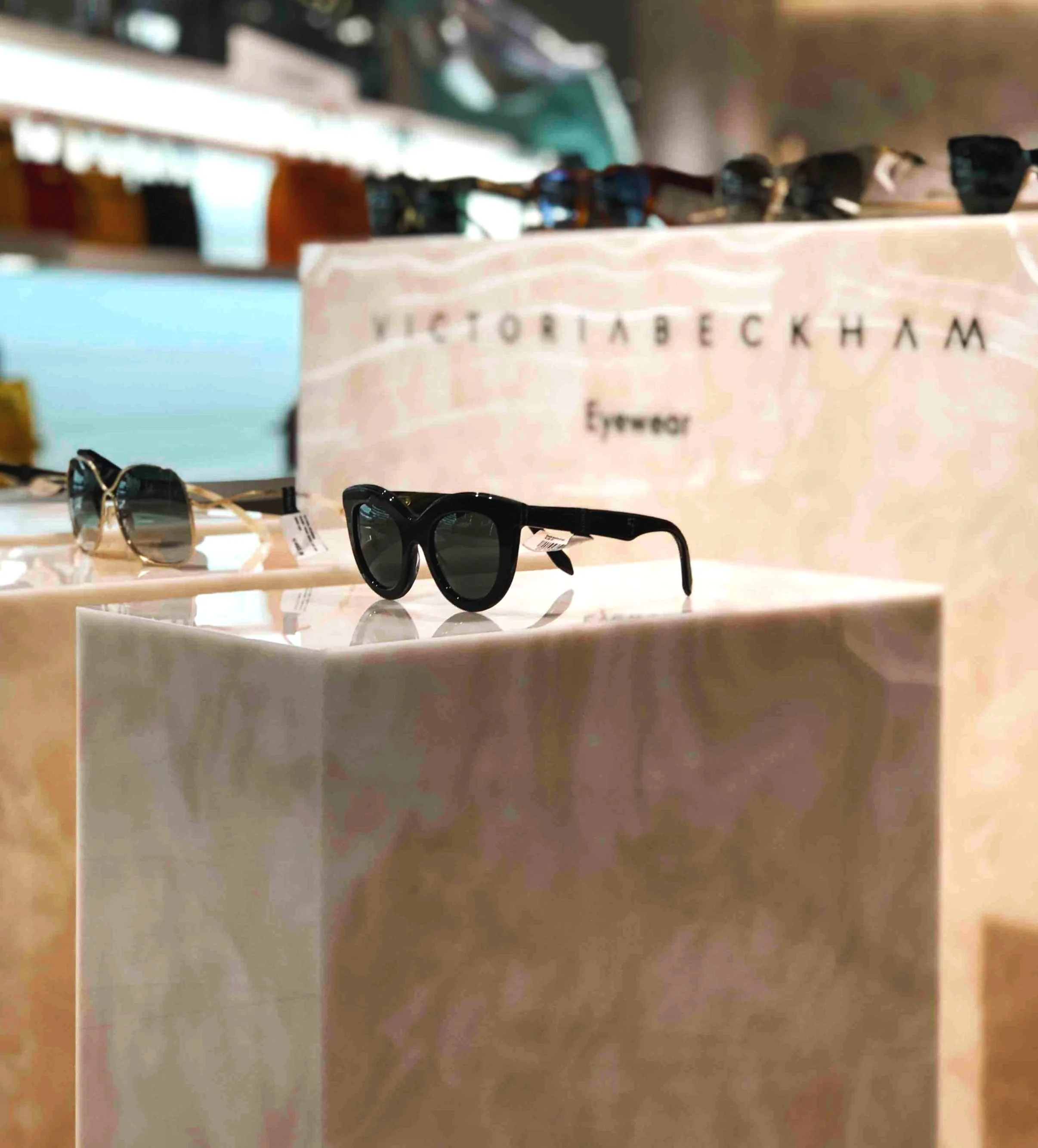 Victoria Beckham Bespoke Retail Pedestal Plinth Display for Harvey Nichols Knightsbridge London. Created, Manufactured and Installed By Vision Creative Visual Marketing Company