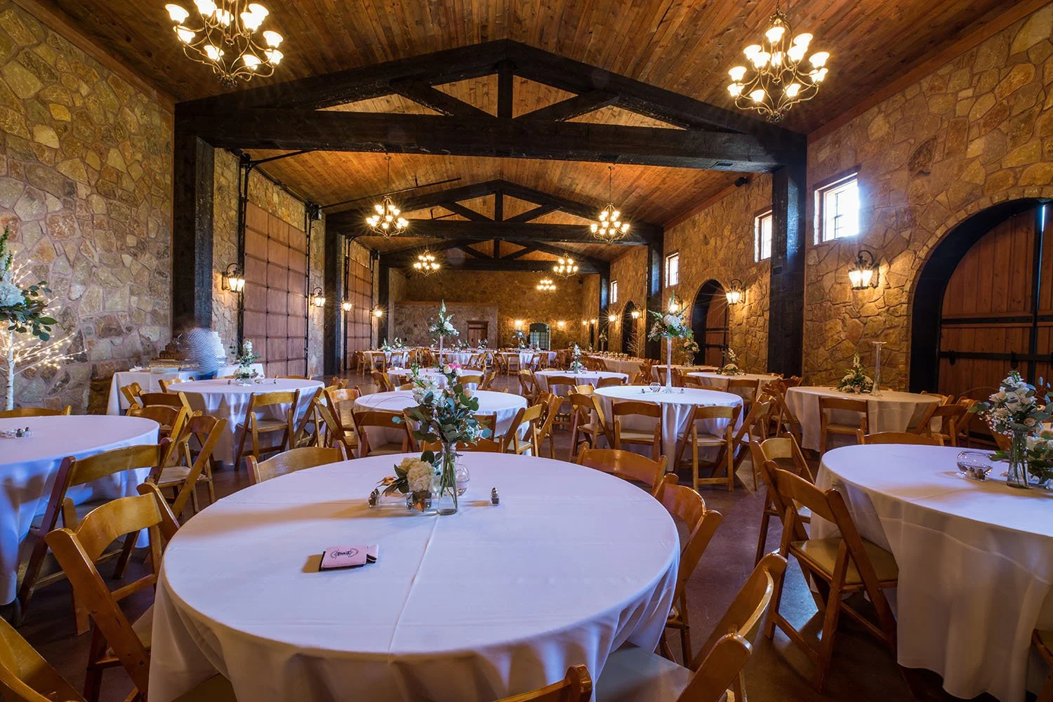 Indoor wedding venue reception at Bella Vita Ranch, a Tuscan style wedding venue in Texas