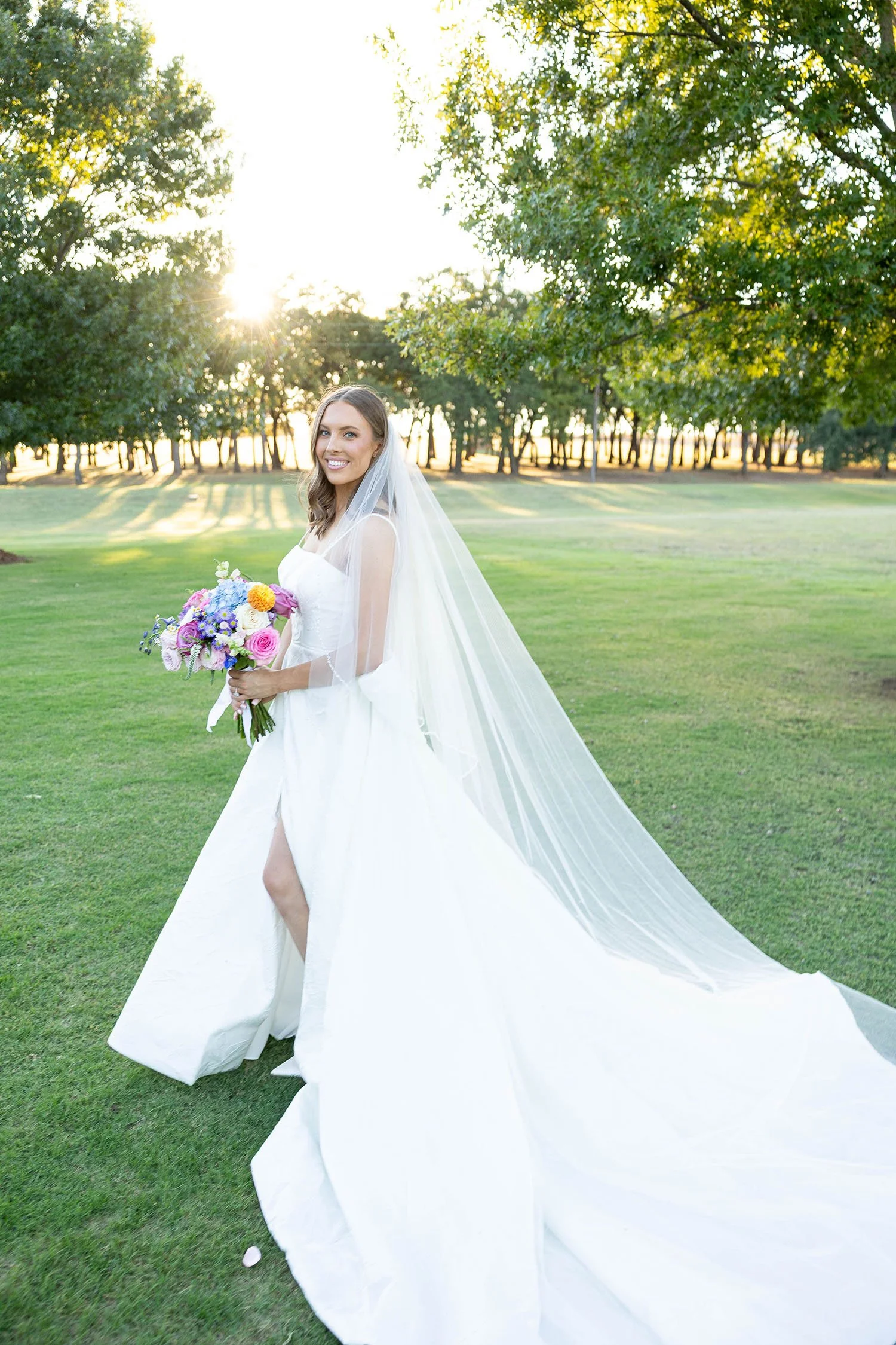 Bridal portrait in our large green yard with lush trees