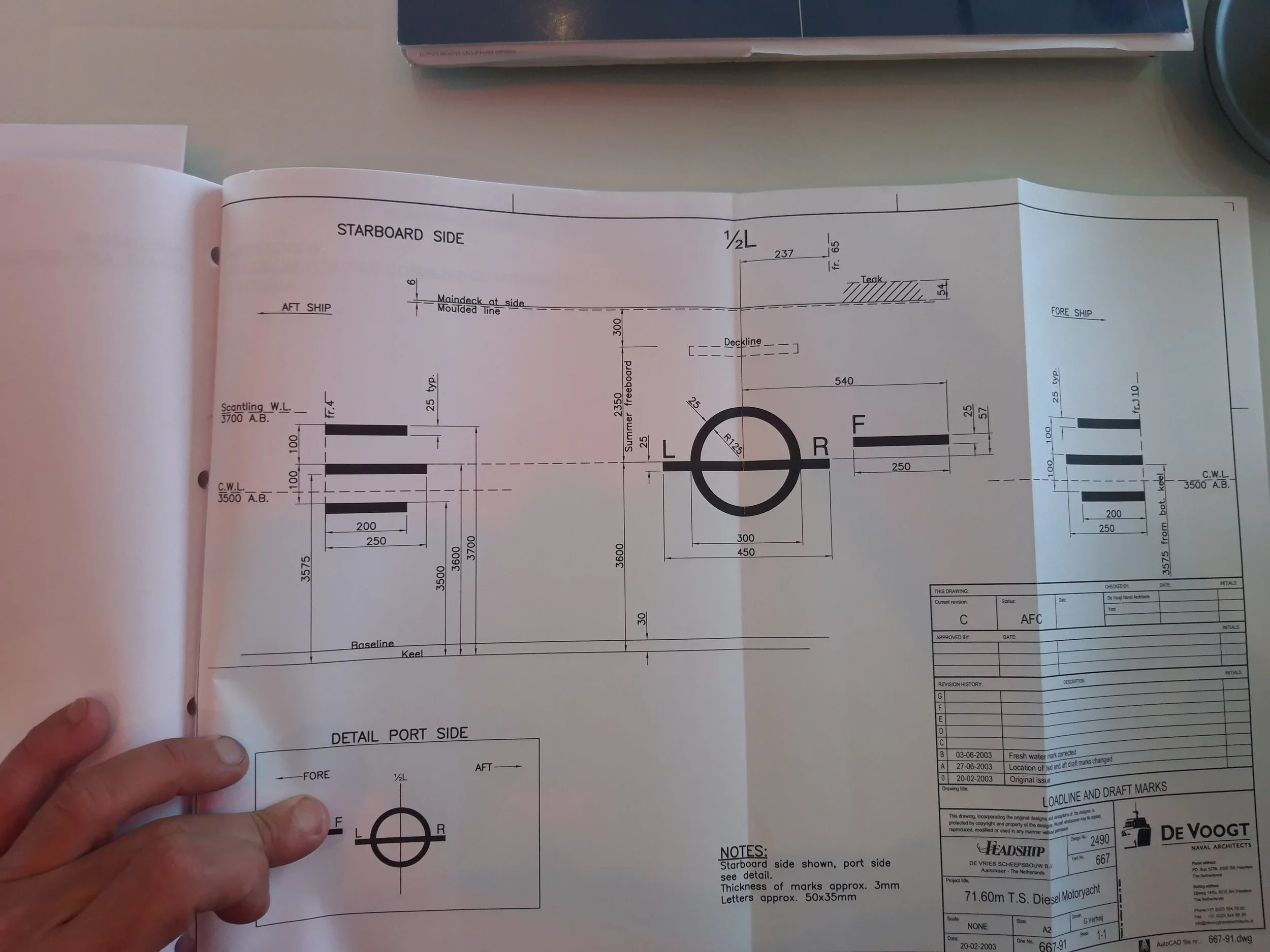 Ship blueprint with detailed measurements of port and starboard sides, including a circular shape and cross-section details.