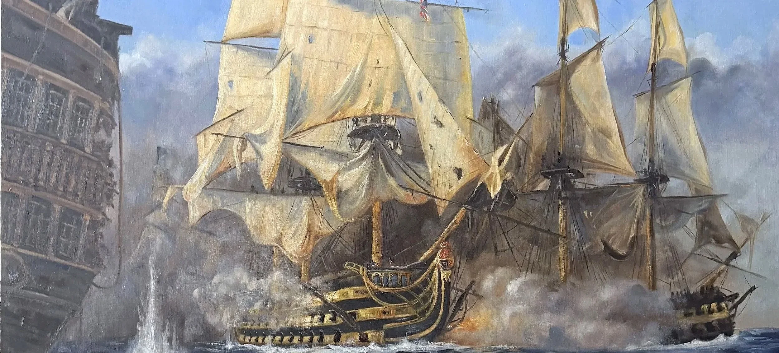 A historic sailing ship with large, torn sails amid smoke, with modern buildings in the background.