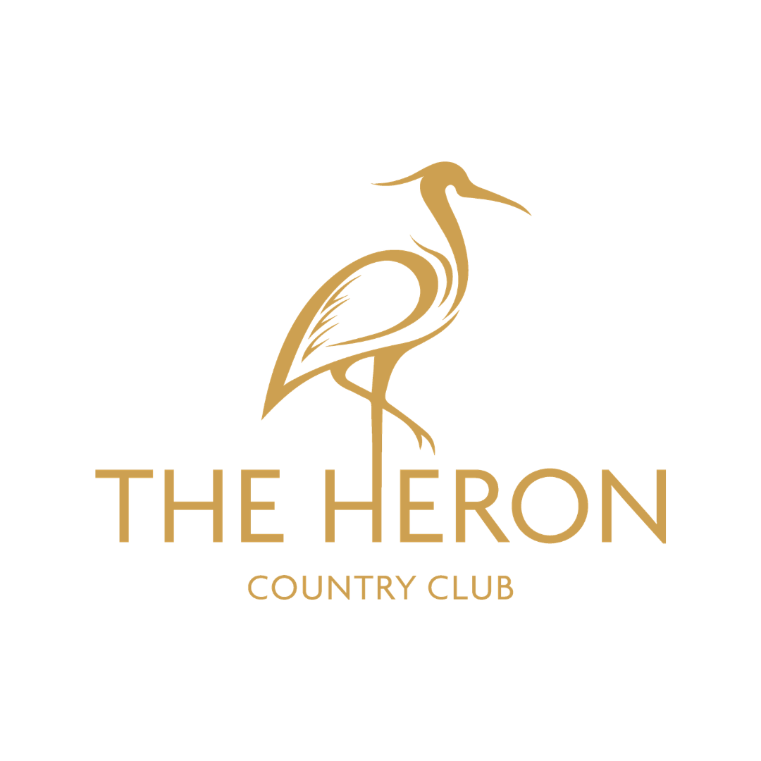 Gold heron silhouette with the text 'The Heron Country Club' below on a black background.
