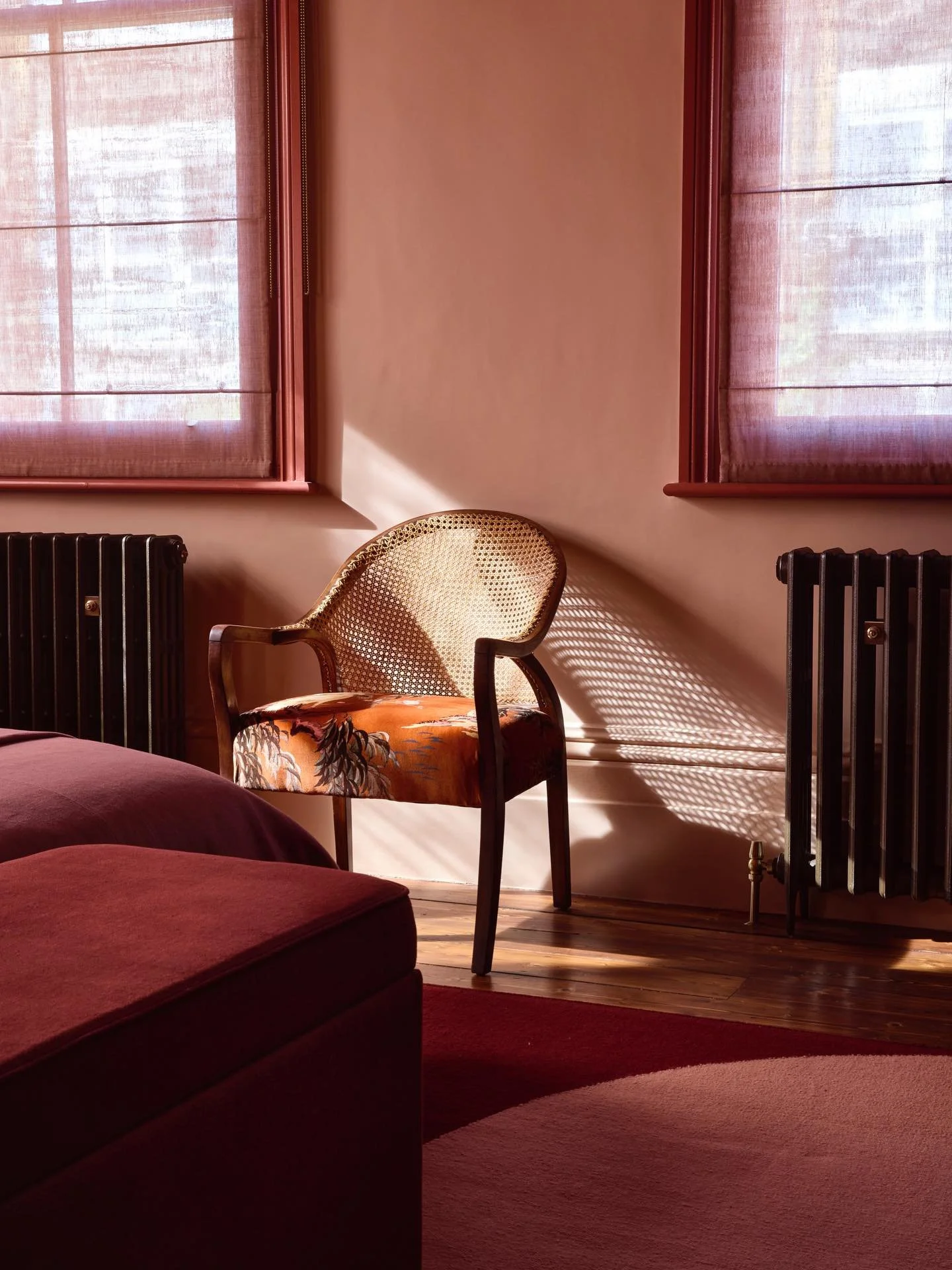 Another stunning space designed by Trifle Creative that highlights our expertise in restoring and upholstering vintage furniture. Bringing new life to this classic cane armchair was truly fulfilling. Upholstered in House of Hackney ZEUS Velvet - Toba