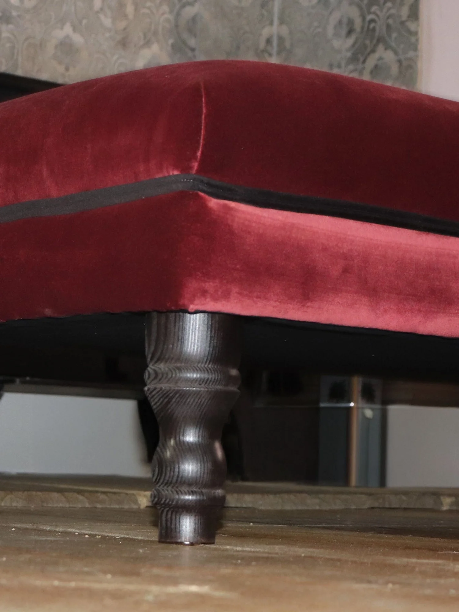 Close up of Henry Ottoman showing the legs in detail.
