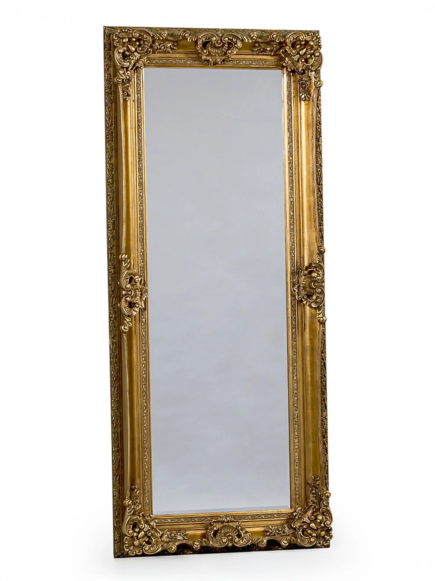 Full-length view of antique gold tall regal mirror with ornate carved frame