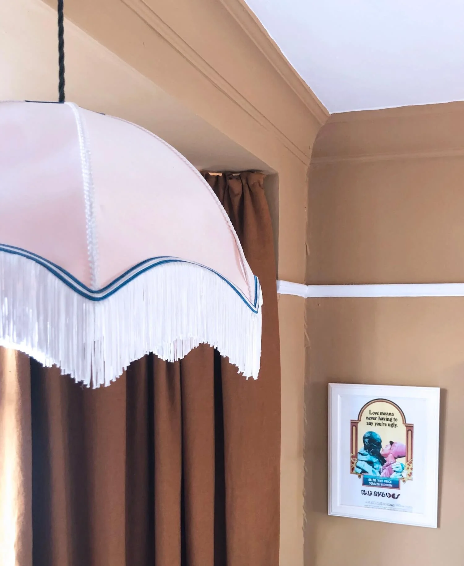 Pendant pink lampshade with a fringing trim