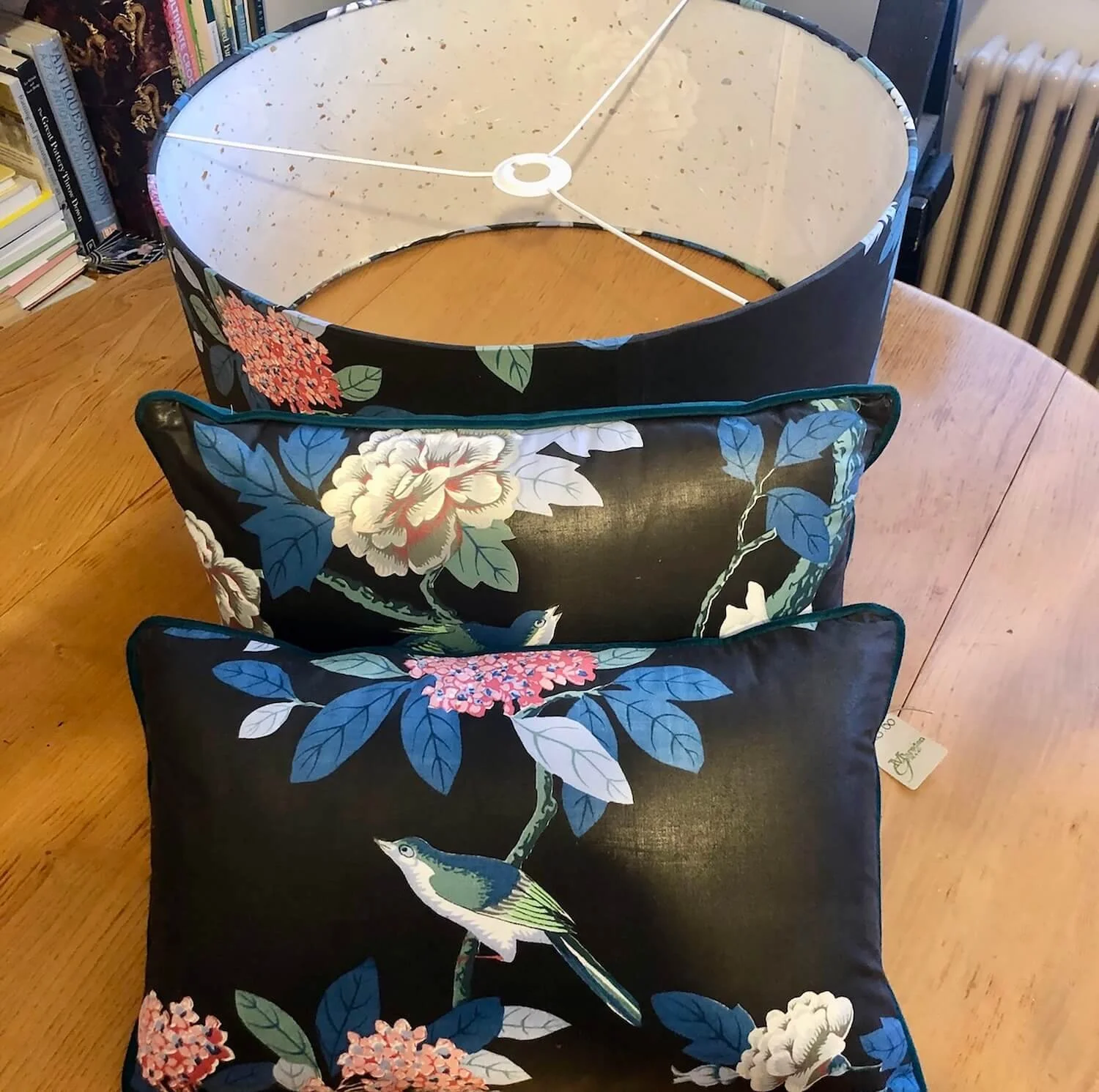 Lampshade with floral print with matching cushions in soft furnishing workshop