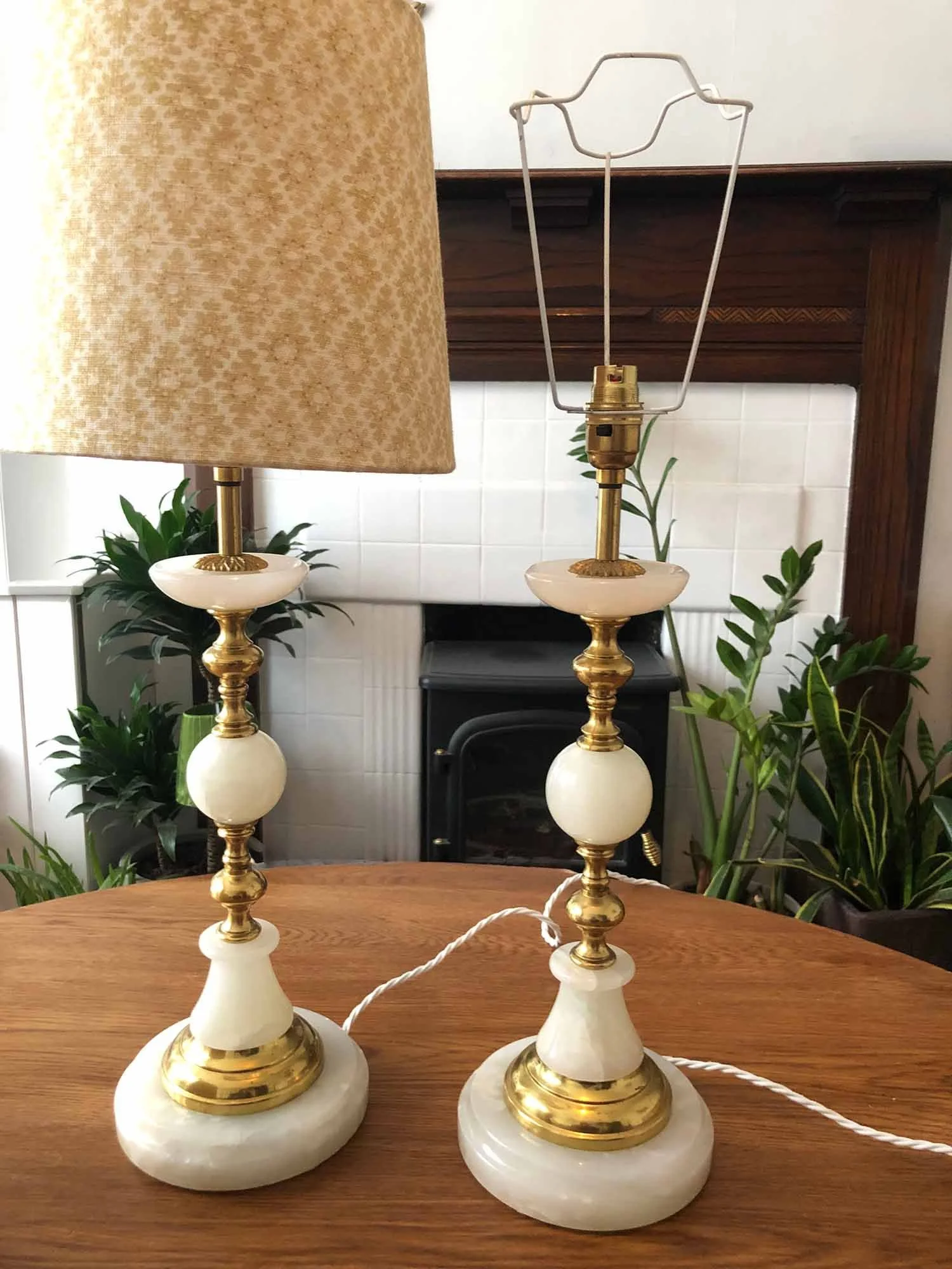 Vintage marble lamp base beside matching lamp with patterned shade