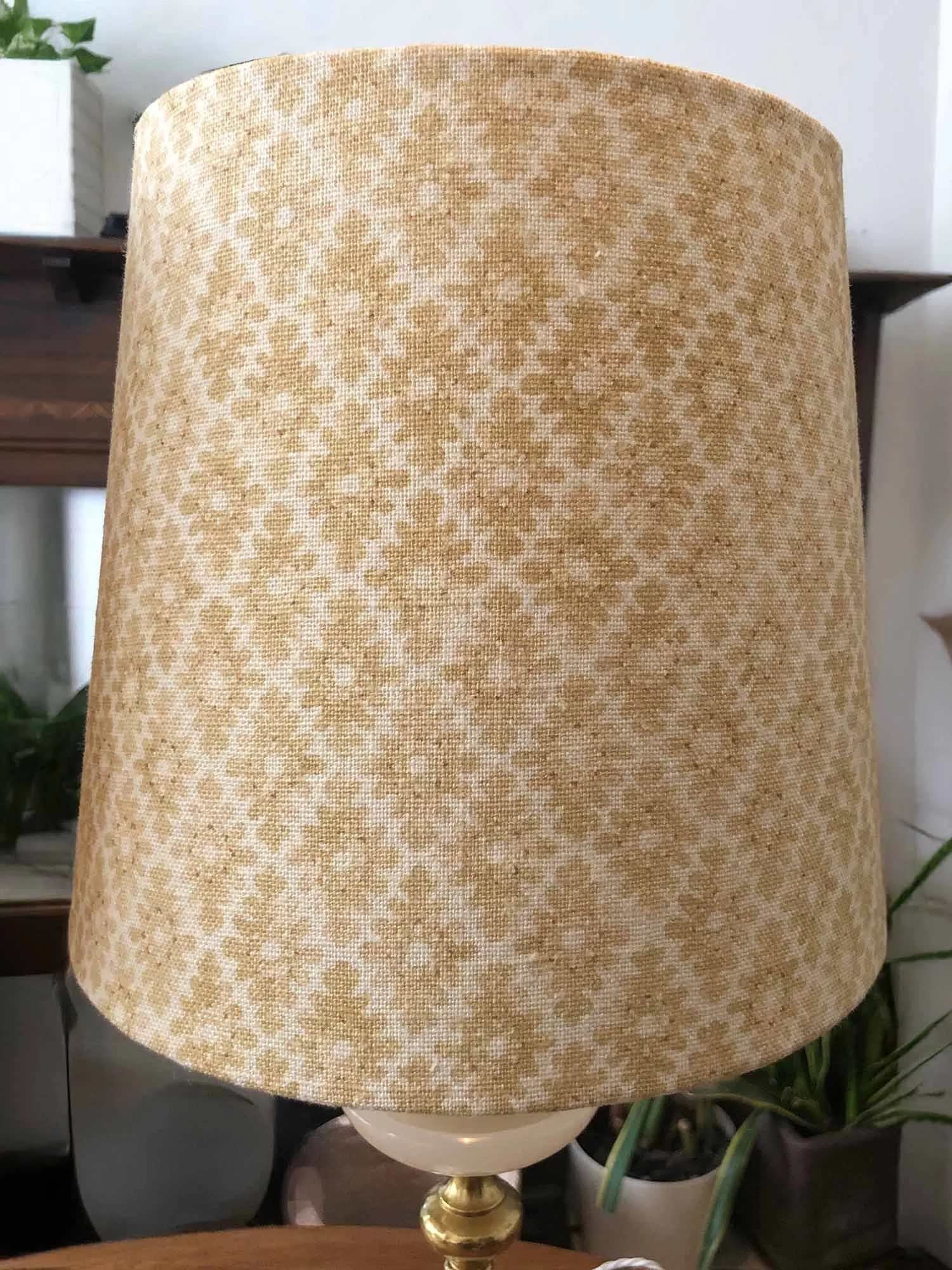 Close-up of cream patterned lampshade fabric texture