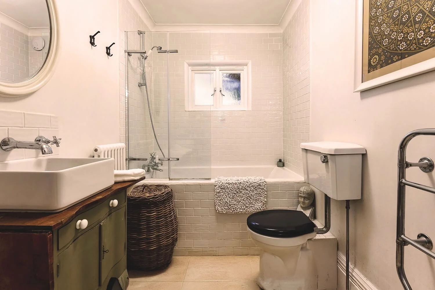 Bathroom with  vintage sink and tiled walls