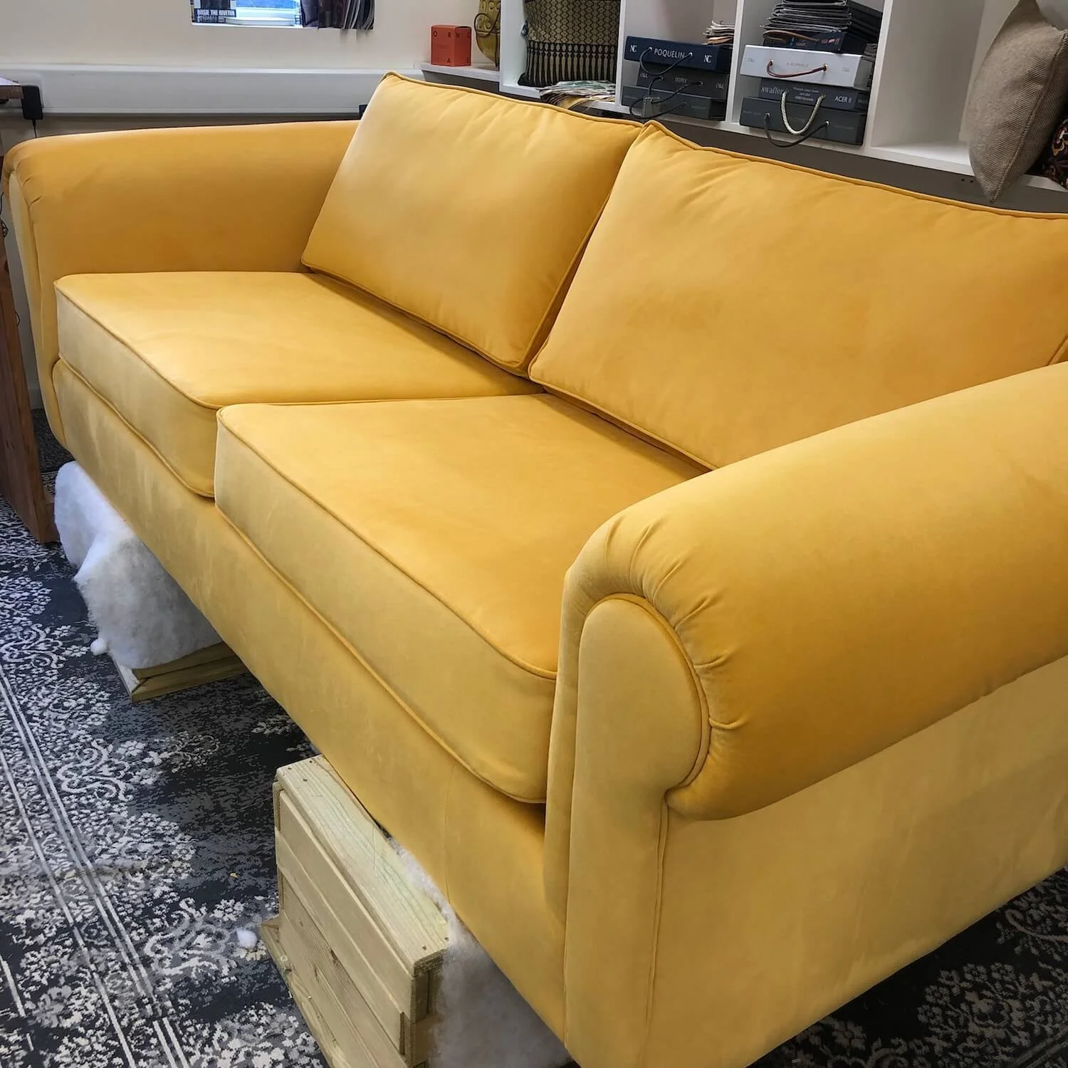 Yellow contemporary sofa newly upholstered in soft velvet