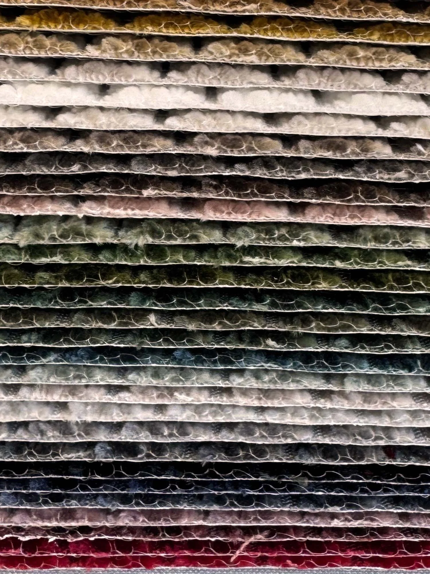 Close up of Mantua Cord fabric book showing all the available colours
