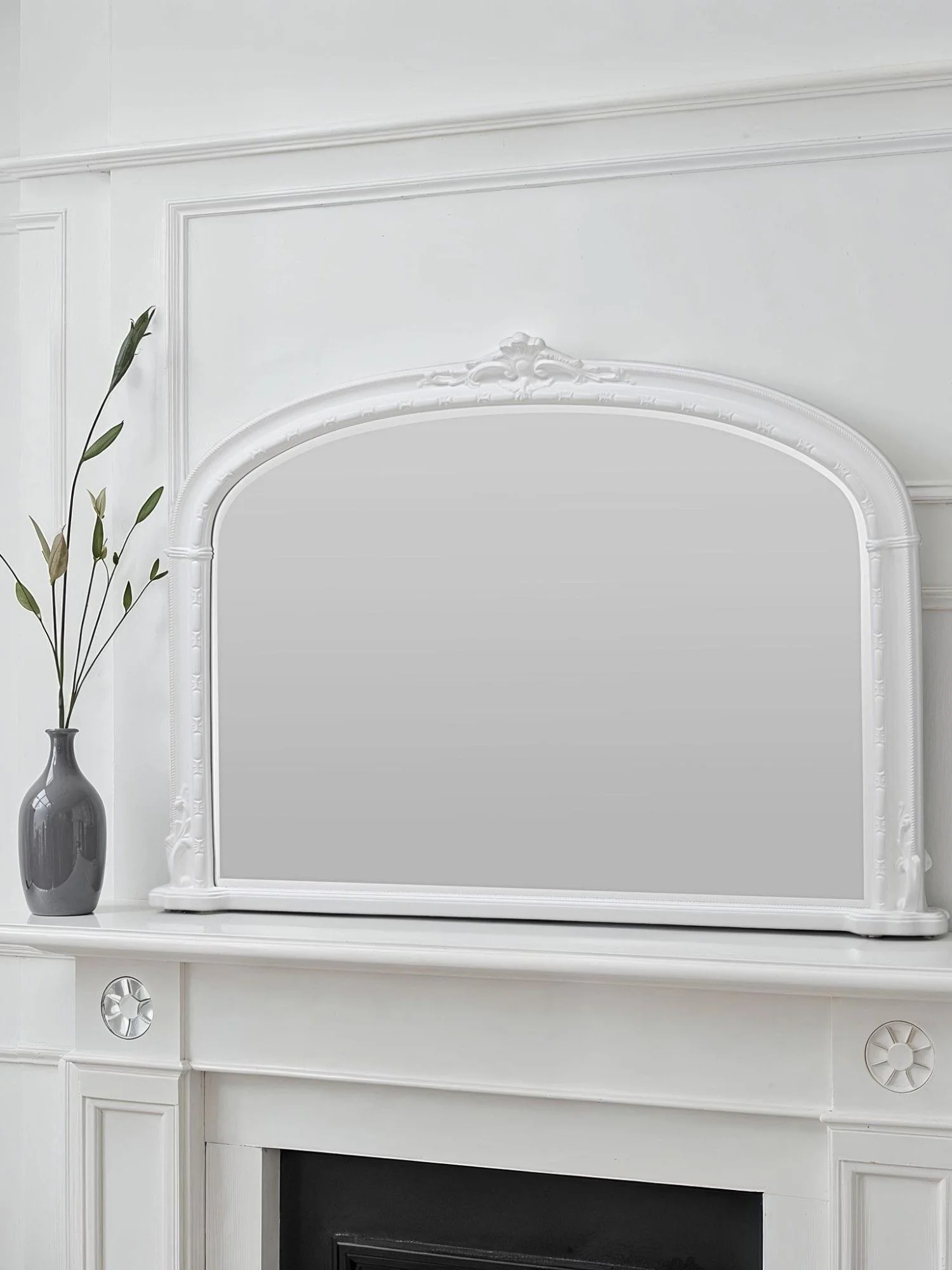 Ornate arched overmantel mirror by Yearn Mirrors London in white