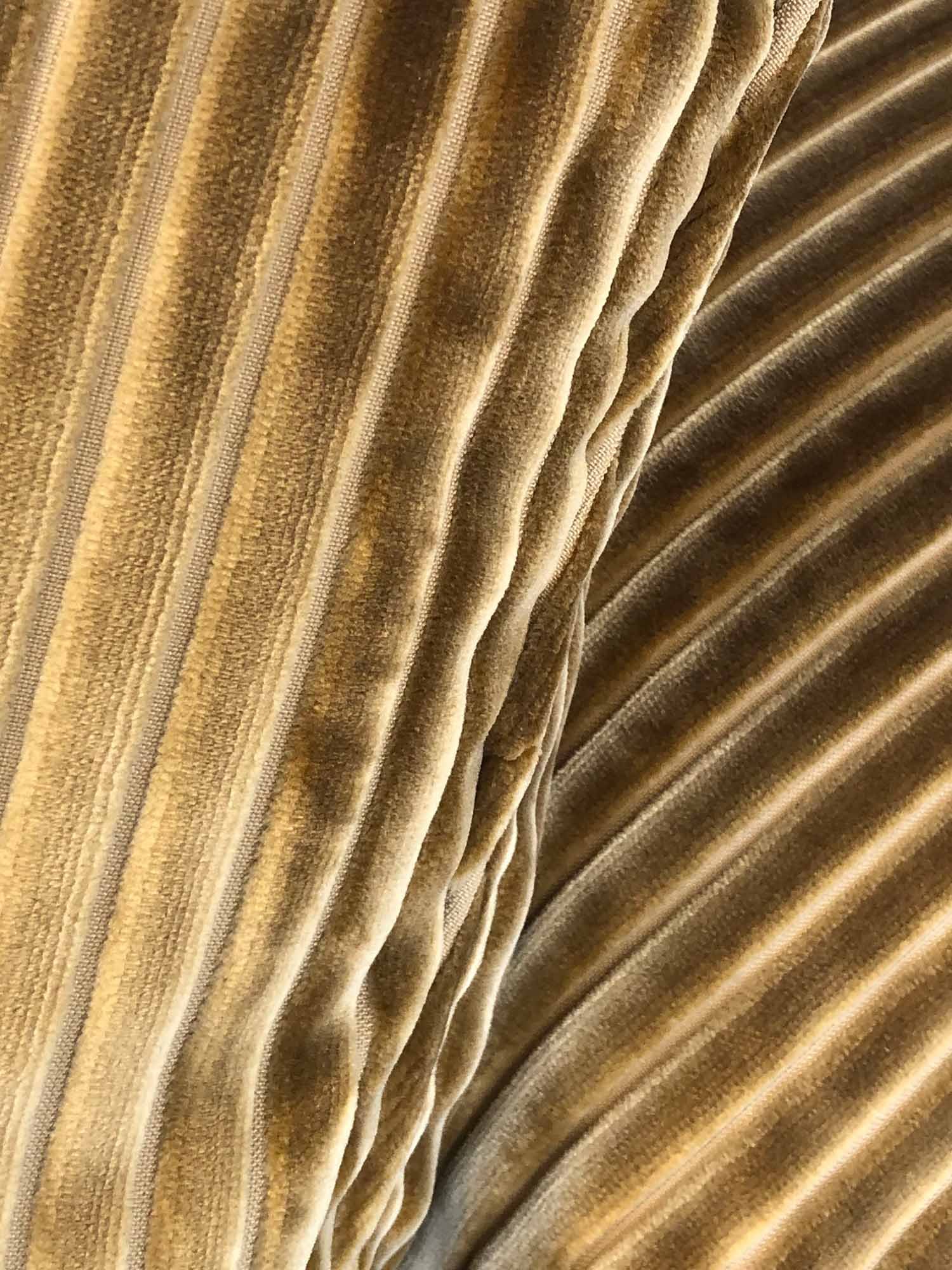 Close-up of Mantua cord cushion showing ribbed caramel velvet texture