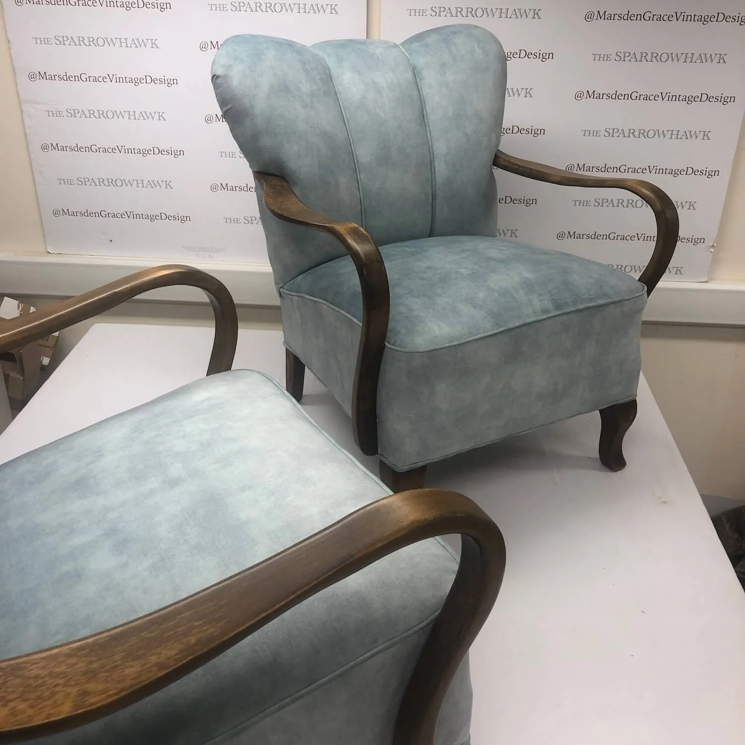 Restored Edwardian armchair upholstered in soft blue fabric