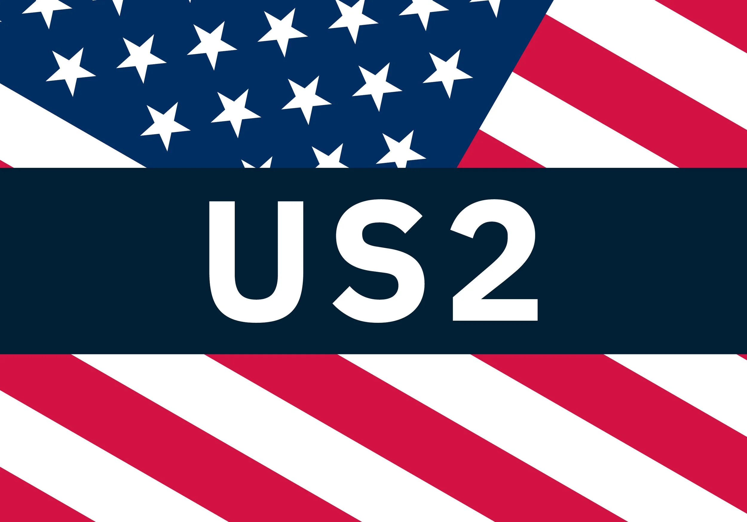 Close-up of an American flag with patriotic colors and stars over stripes, partially covering a sign with the text 'US2'.