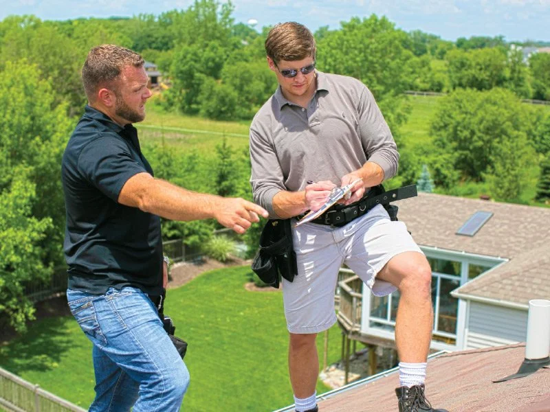 professional roof inspection with insurance adjuster