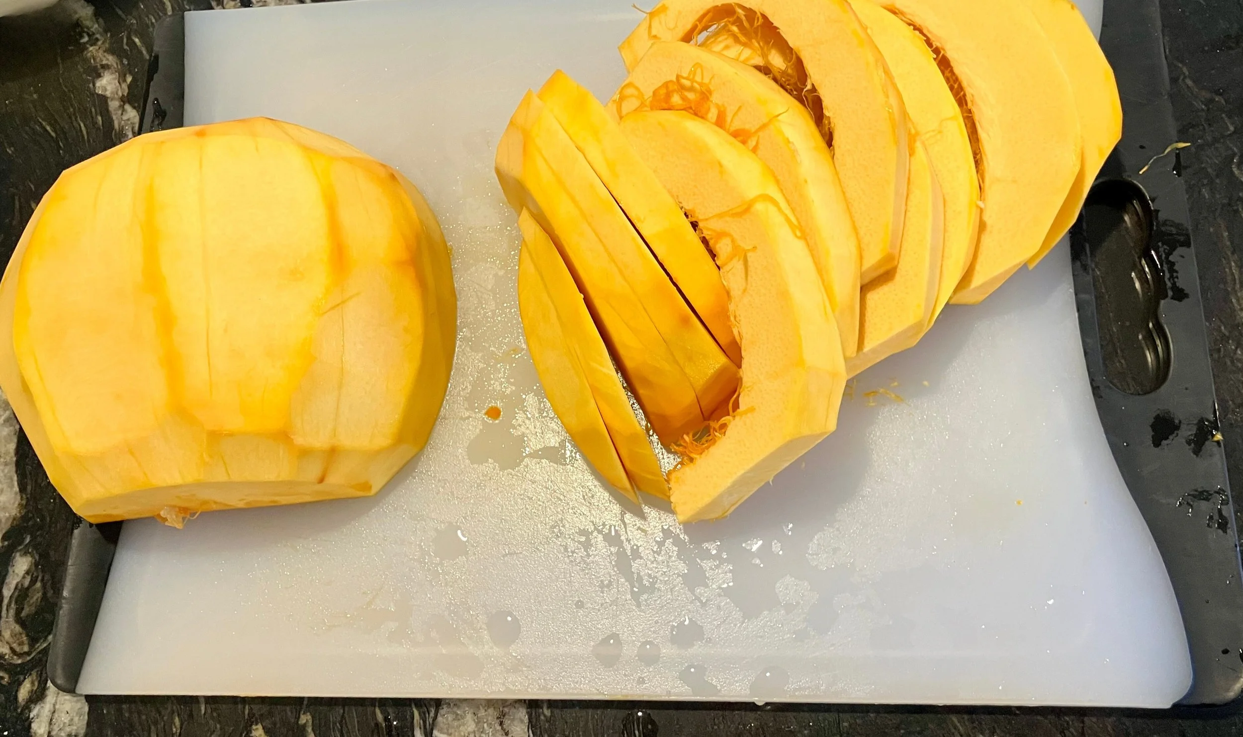 cutting a sugar pumpkin