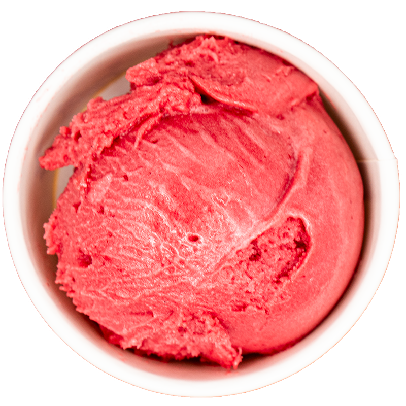 A scoop of pink strawberry ice cream in a white bowl.