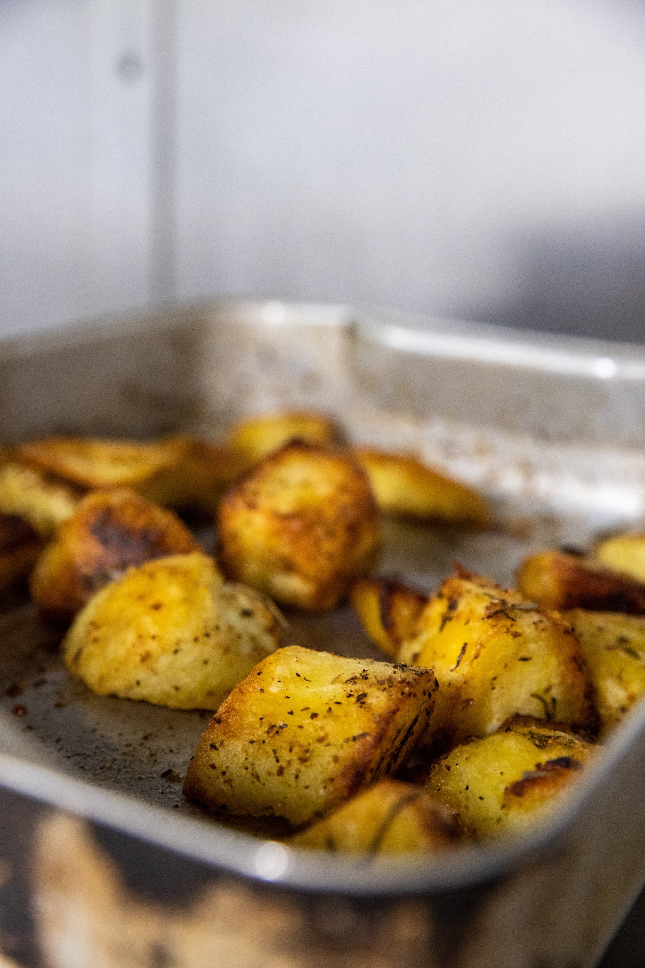 Roasted potatoes on a baking sheet.