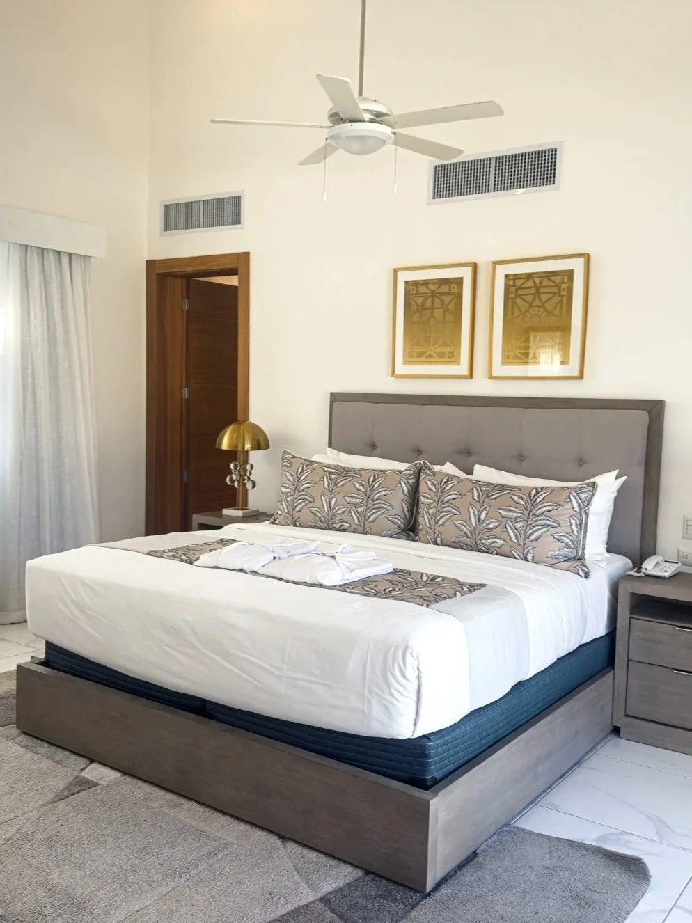 Luxury master bedroom with king-size bed and sophisticated interior design