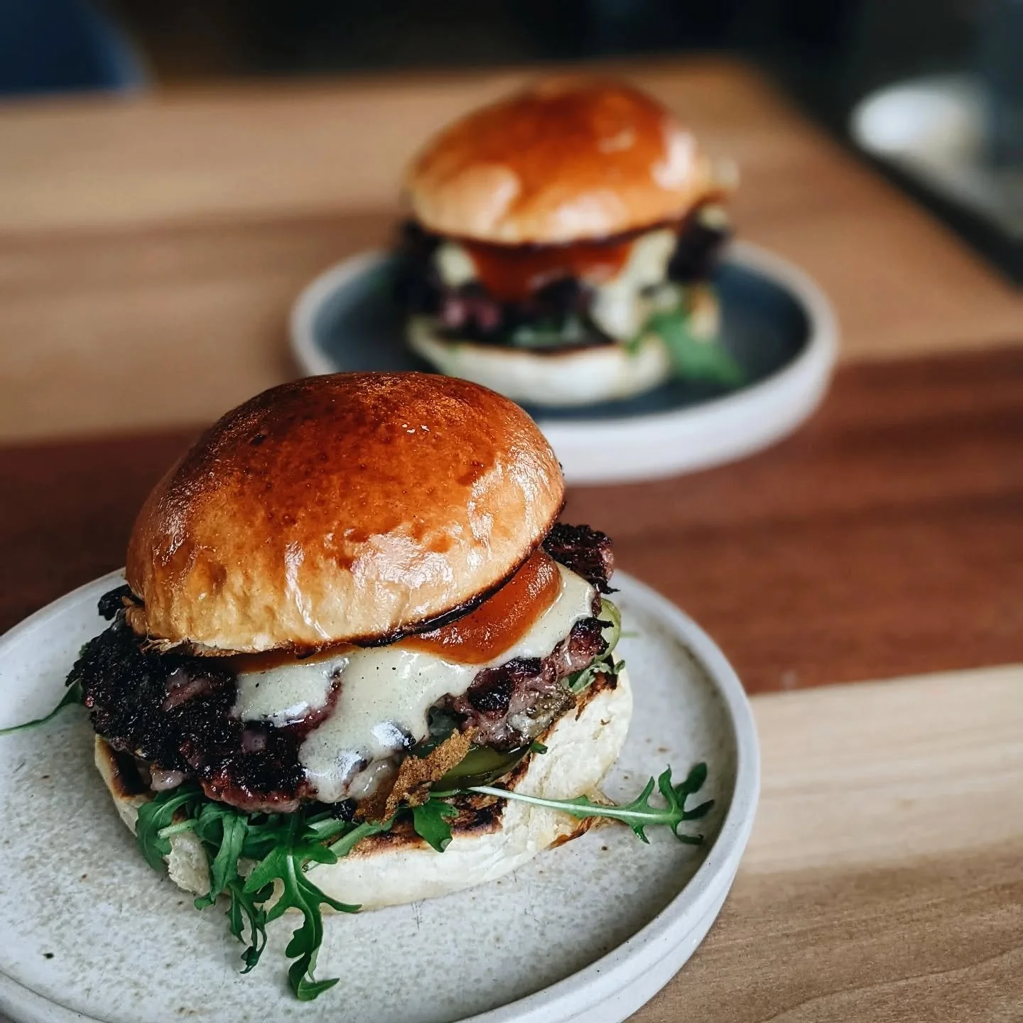 The sun has clocked in for a shift and we're taking orders for this evening ☀️ 

Our indoor and outdoor seating is open for use or our burgers and beers travel well to the lake 🤘