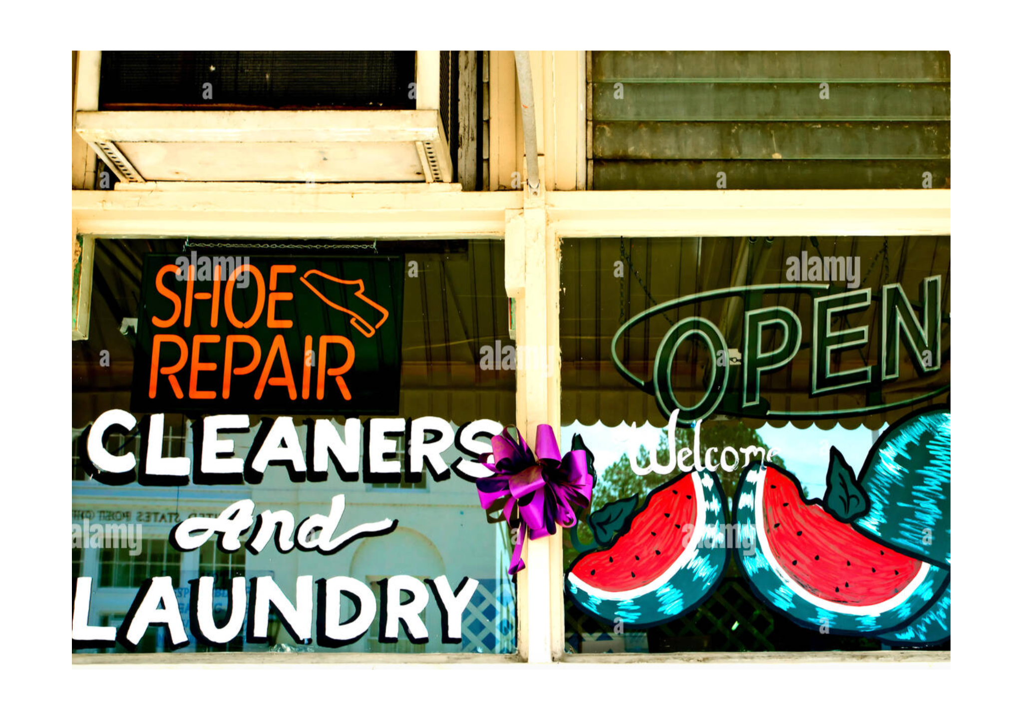 Store window with neon signs that say "Shoe Repair," "Cleaners," "Open," and "Welcome." There are also colorful watermelon and butterfly illustrations, and a purple ribbon decoration.