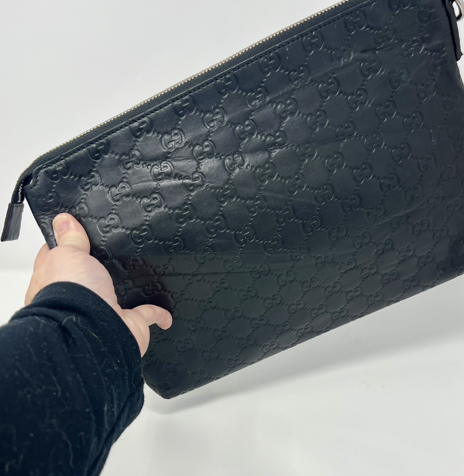 Gucci Black GG Embossed Leather Pouch