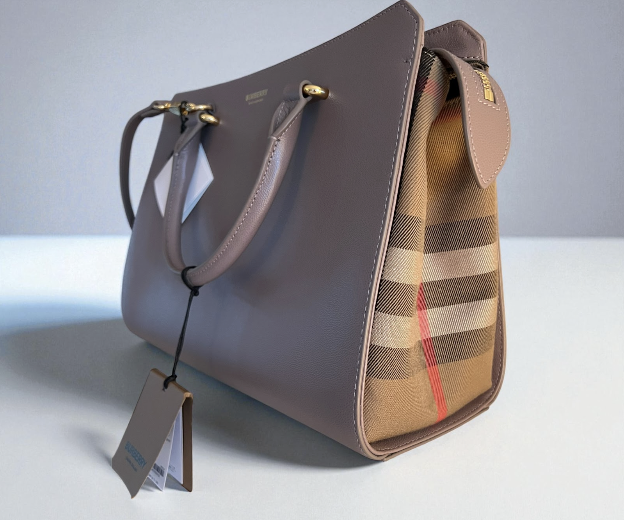 Burberry London Grainy Leather Top-Handle Clutch Bag.png