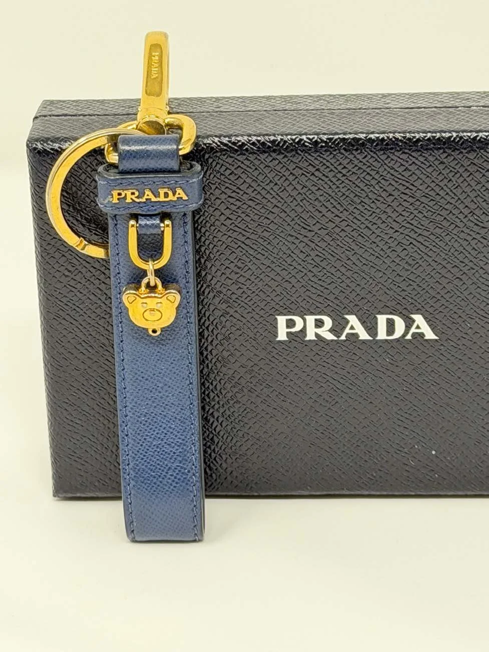 Prada_Saffiano_Leather_Bear_Keychain_(Navy).jpg