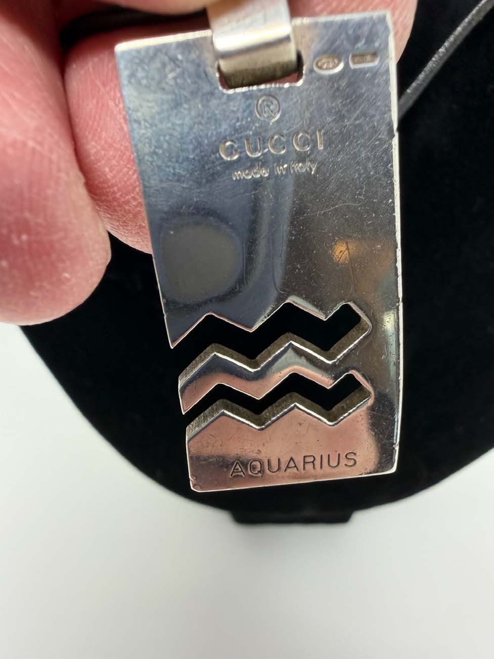 Gucci_Sterling_Silver_Aquarius_Zodiac_Pendant_Necklace_2.jpg