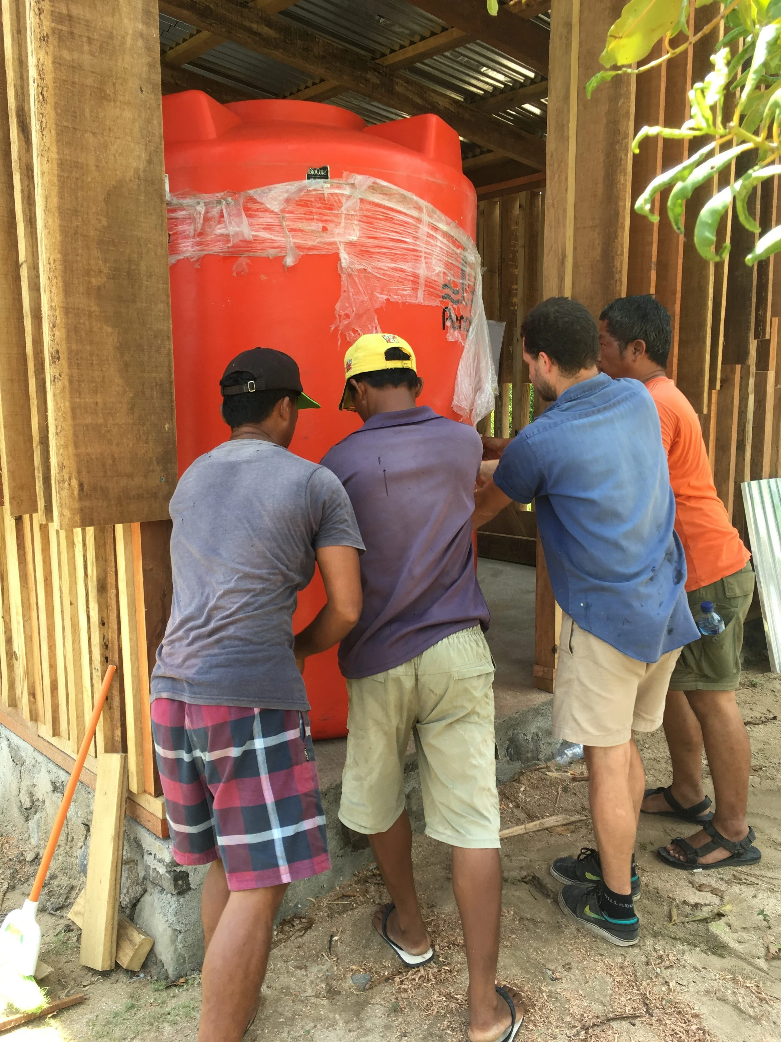  One of the new water tanks being installed. The finished project will have multiple tanks holding up to 9000 liters. 