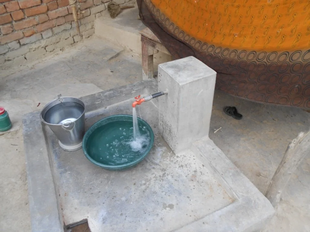  Now that the solar panels are up, electricity is being generated to run the water pump and deliver water directly into the homes of local villagers. One of the best parts of this project is that it is delivering water to the individual homes and not