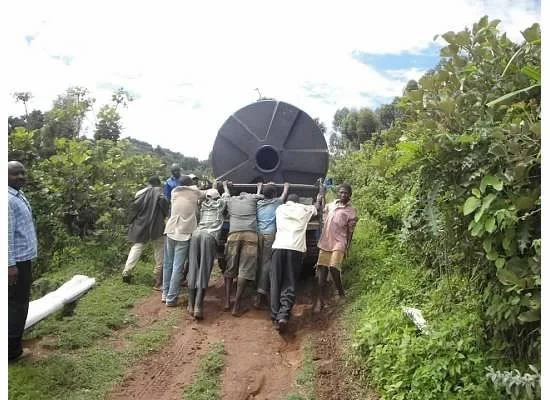  The second water tank made it’s way to the Nymiyaga School in Uganda to provide water for the schools’ Feeding Program. The logistics for projects like this are not easy, but many of the local people are working to support this important effort for 