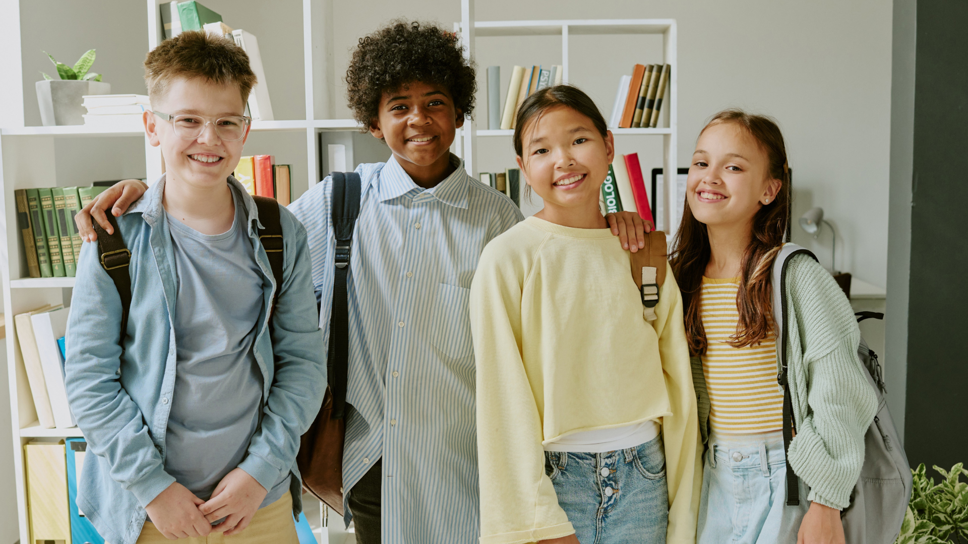 A group of adolescent friends smiling.